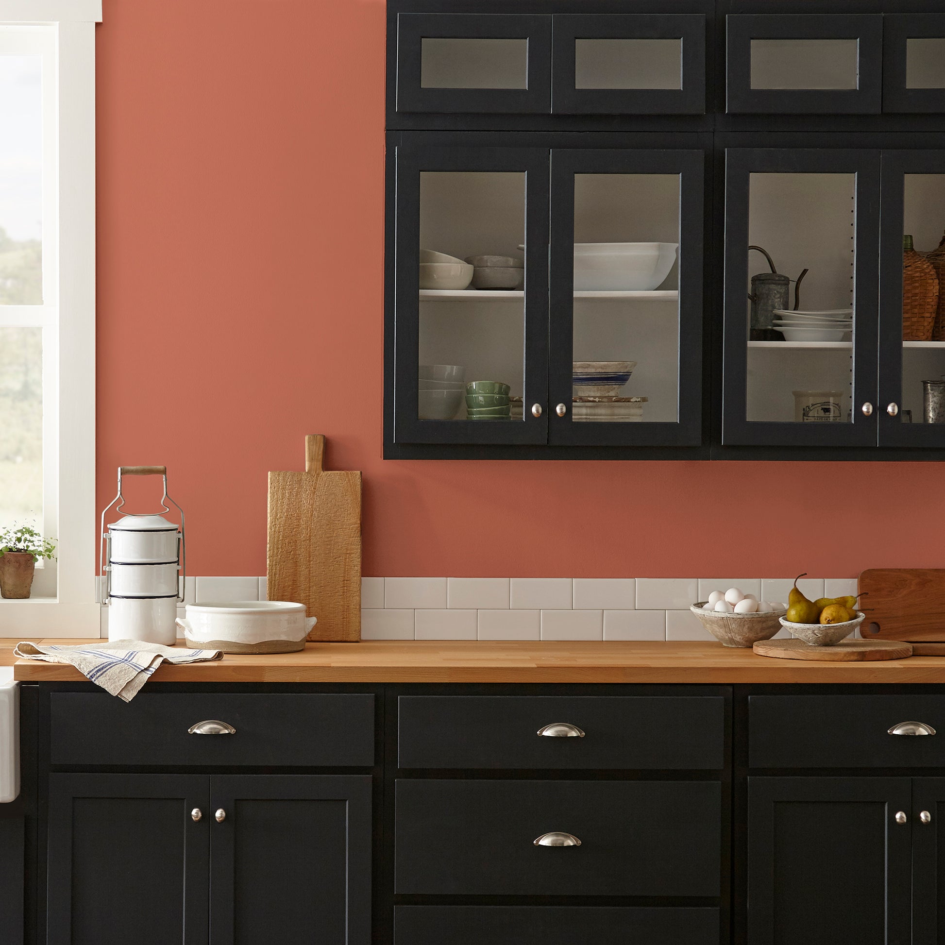 Deep Terra Cotta interior paint named on bosque shown painted on kitchen wall