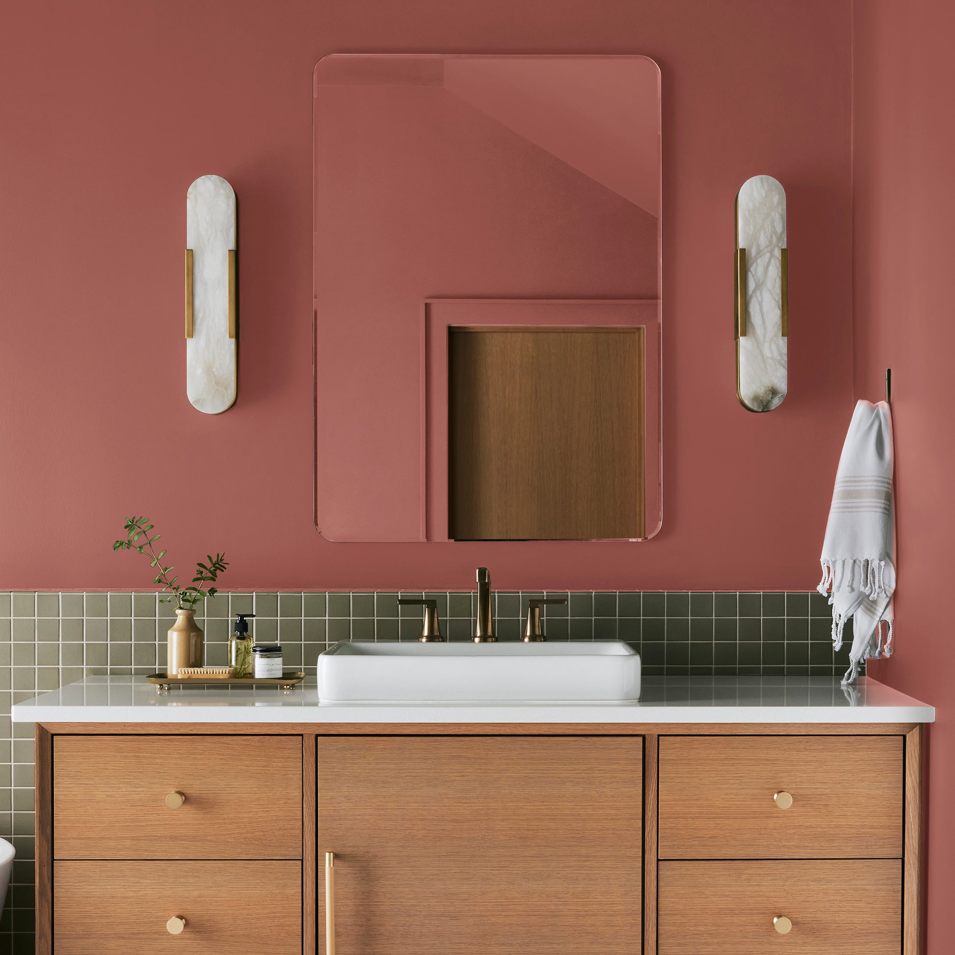 dark rust-red paint named home at last shown painted on bathroom wall