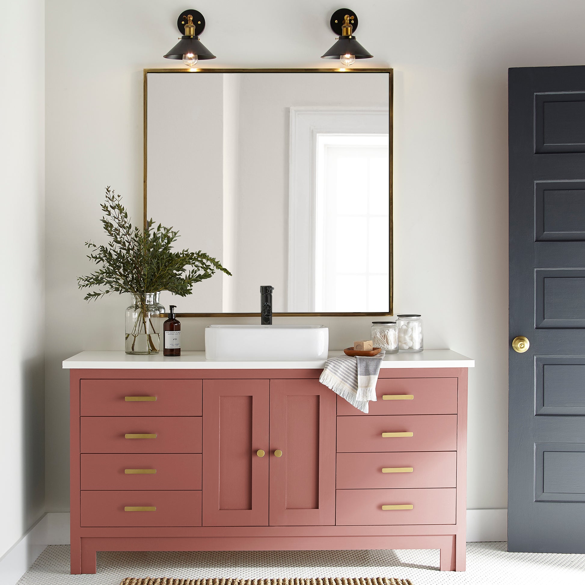 dark rust-red paint named home at last shown painted on bathroom cabinet
