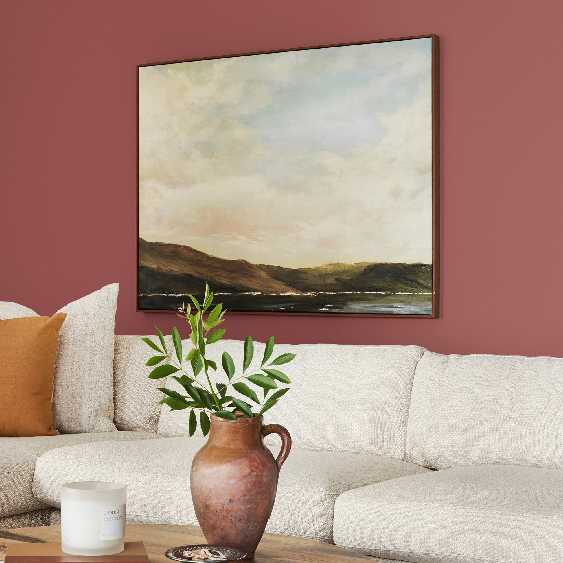 deep red paint named create shown painted on living room wall
