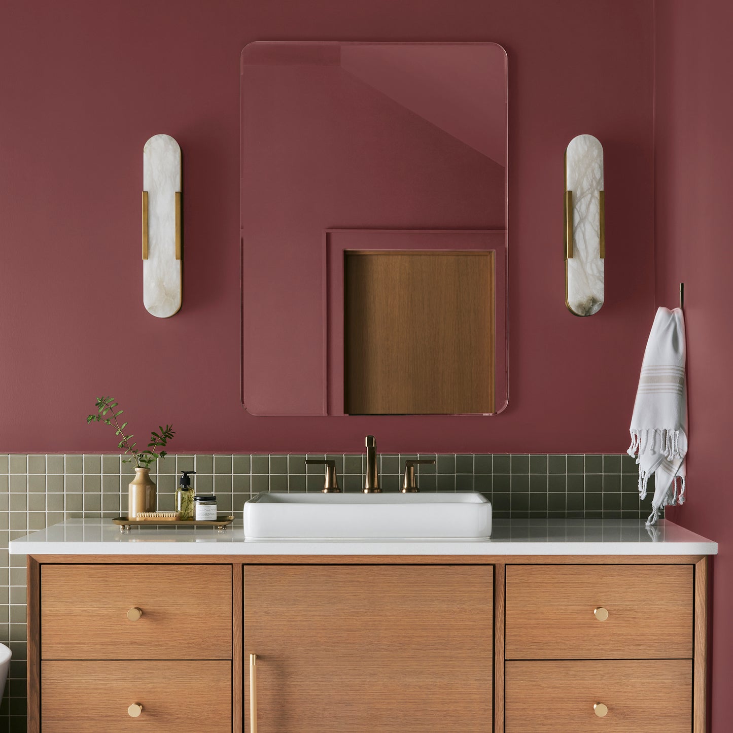 Deep antique red interior paint named by the fireplace shown painted on bathroom wall
