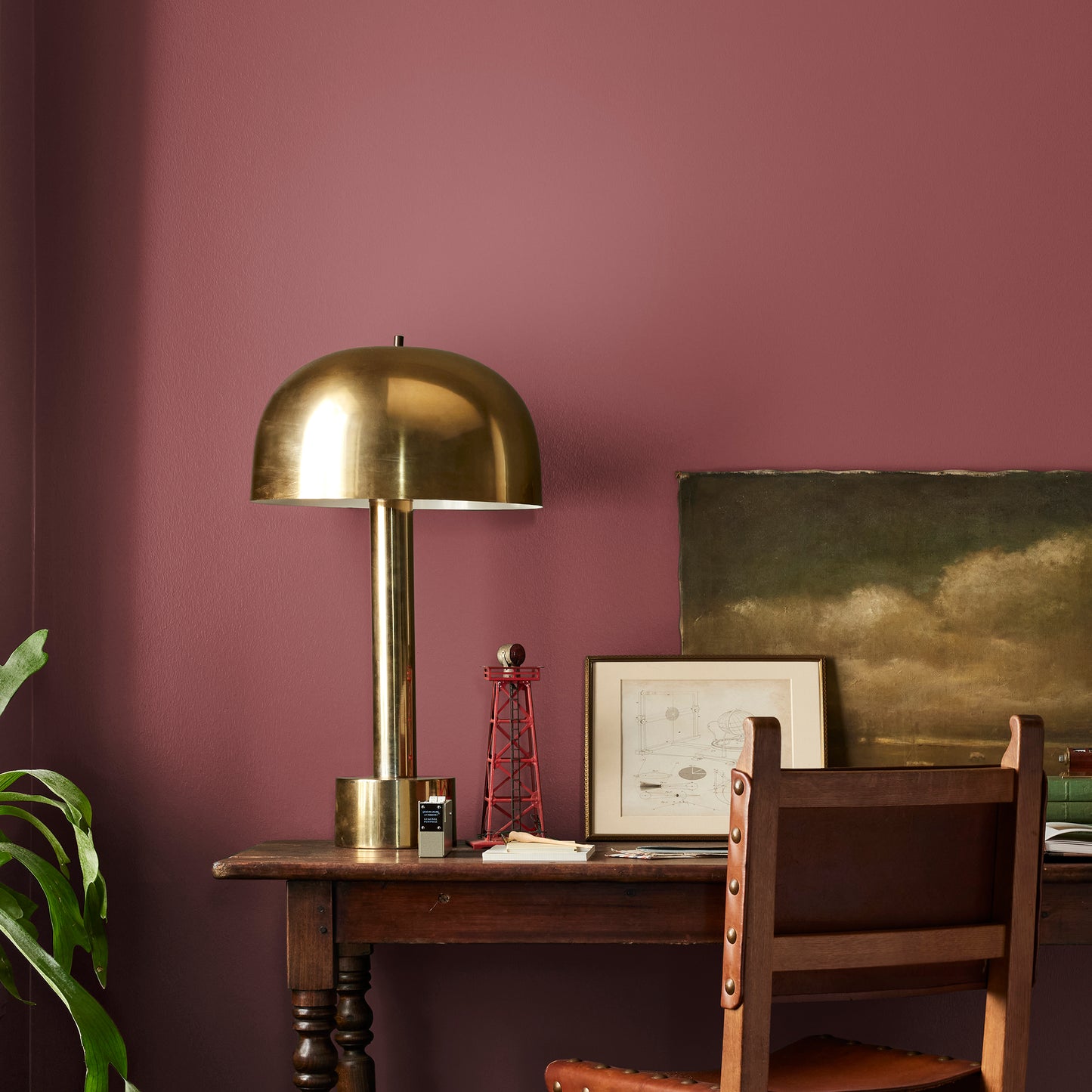 Deep antique red interior paint named by the fireplace shown painted on bedroom wall