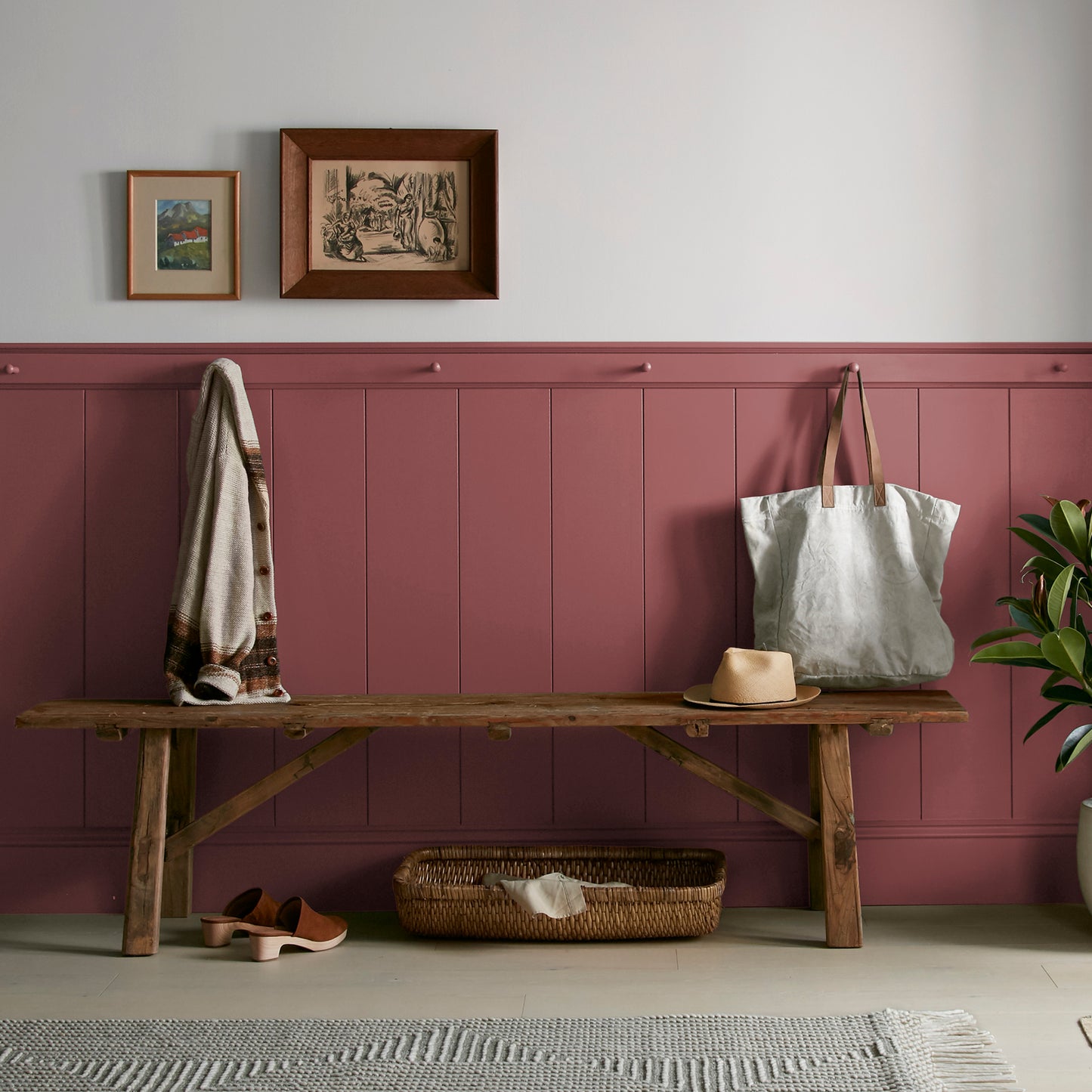 Deep antique red interior paint named by the fireplace shown painted on entryway wall