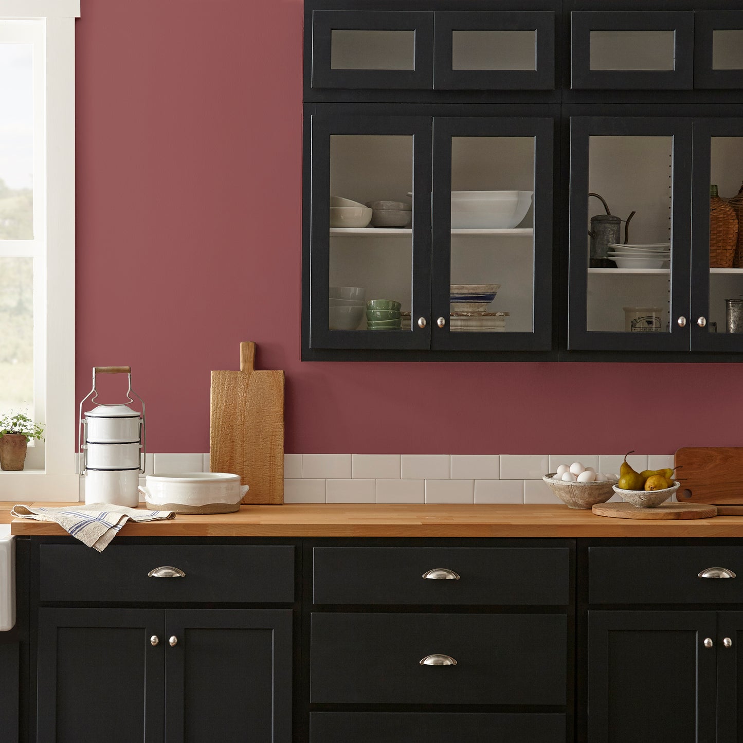 Deep antique red interior paint named by the fireplace shown painted on kitchen wall