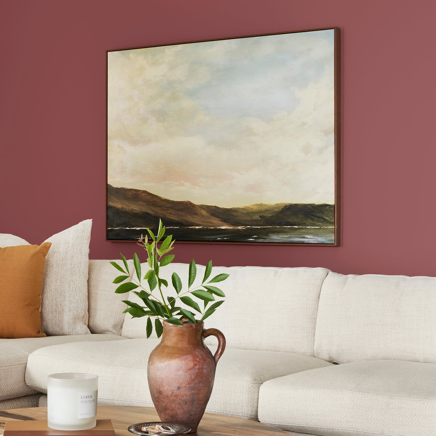 Deep antique red interior paint named by the fireplace shown painted on living room wall
