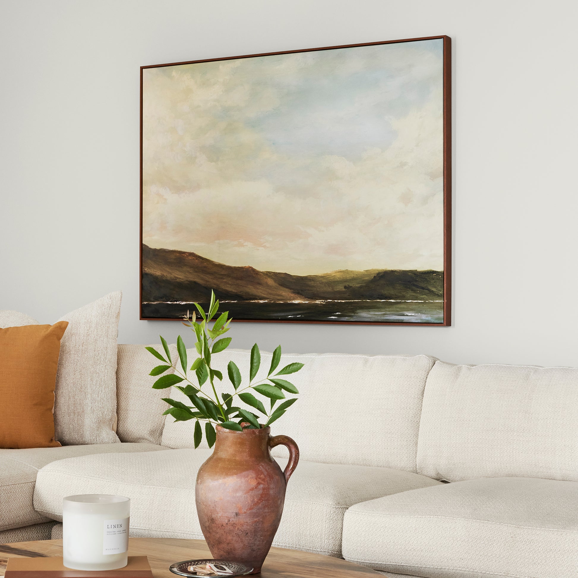 Crisp white with beige interior paint named panna cotta shown painted on living room wall