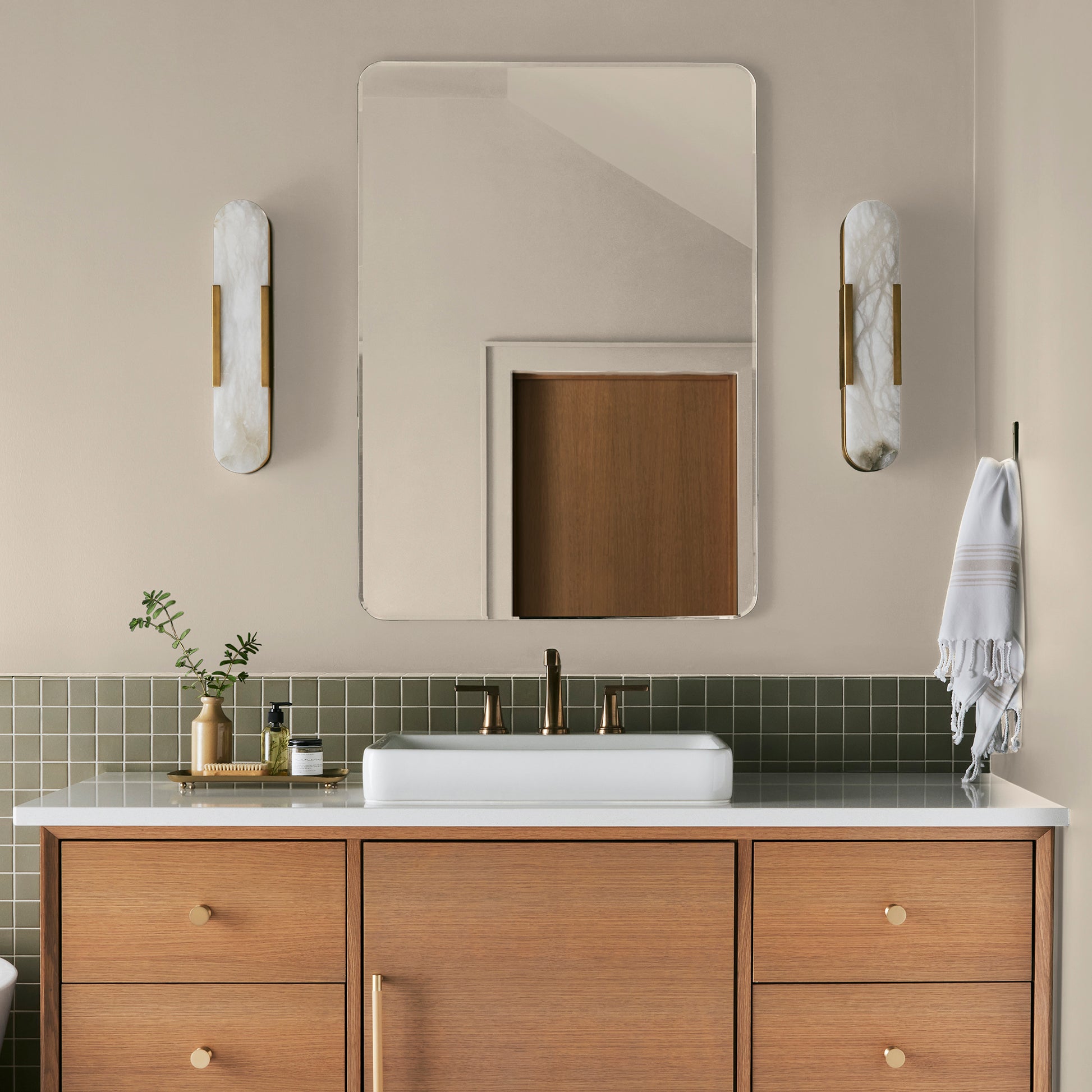 Warm white with soft notes of beige and honey interior paint named lit candles shown painted on bathroom wall