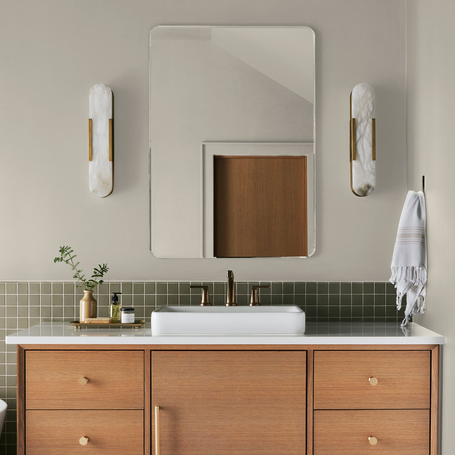 Warm beige interior paint named blanched shown painted on bathroom wall