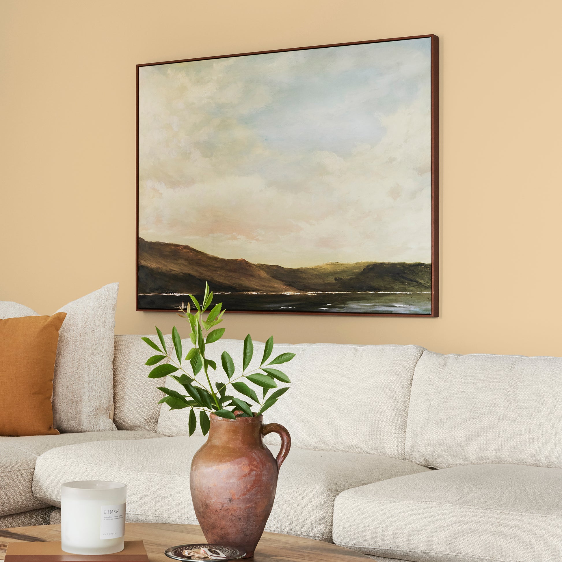 Creamy honey and citrus yellow interior paint named lemony shown painted on living room wall