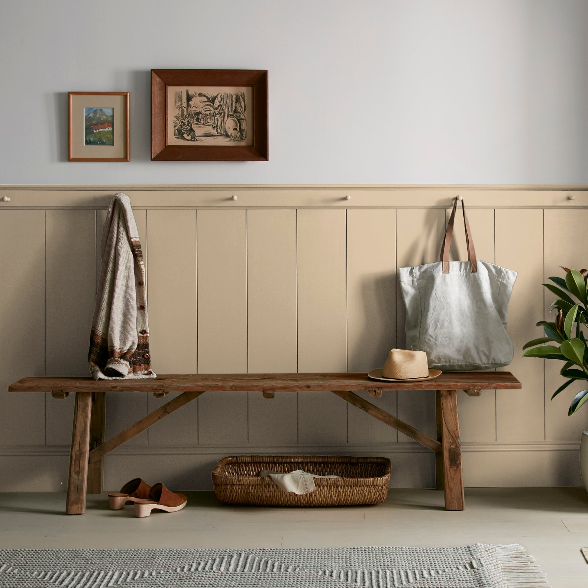 Light sandy gold interior paint named summer pear shown painted on entryway wall