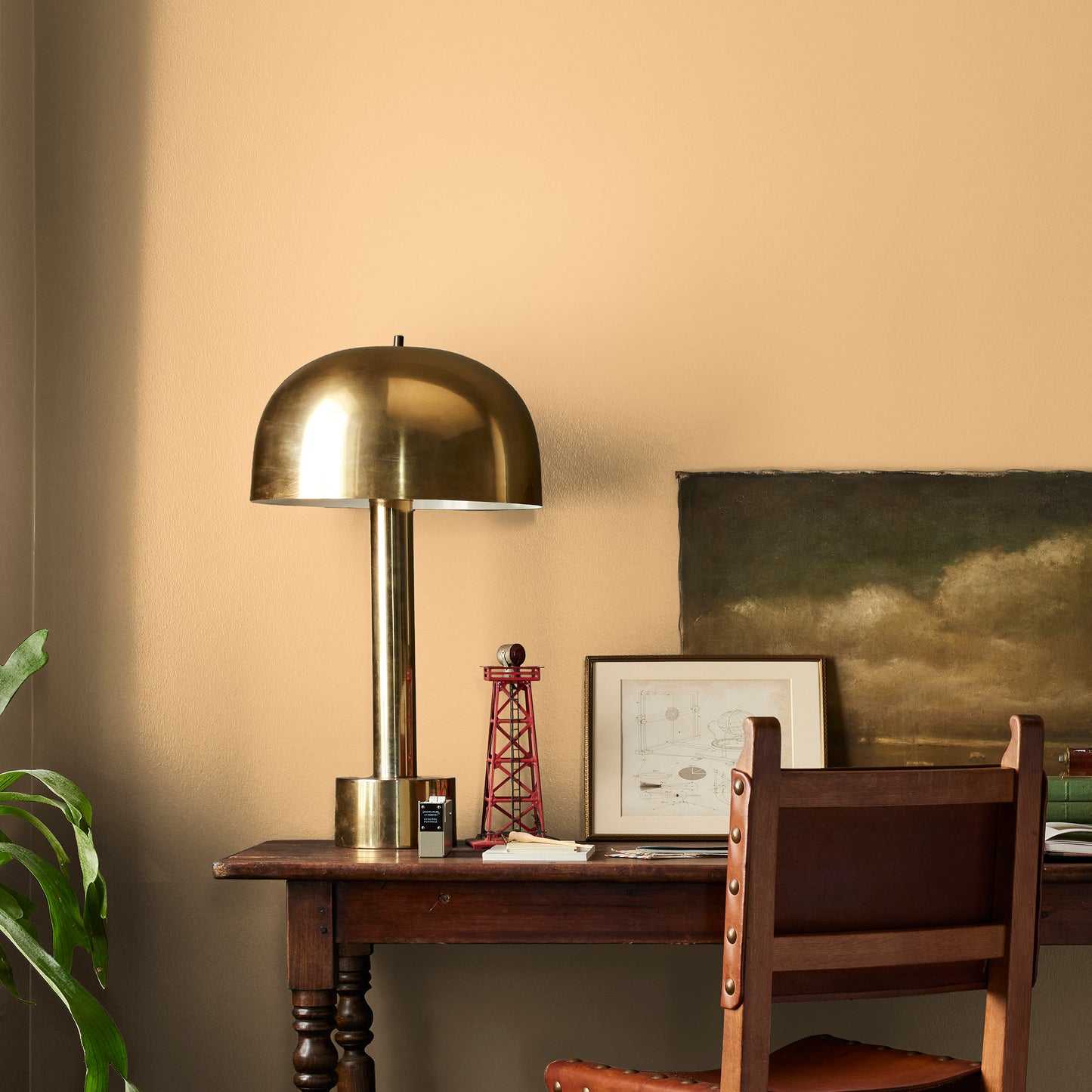 golden-yellow classic interior paint named amber shown painted on bedroom wall