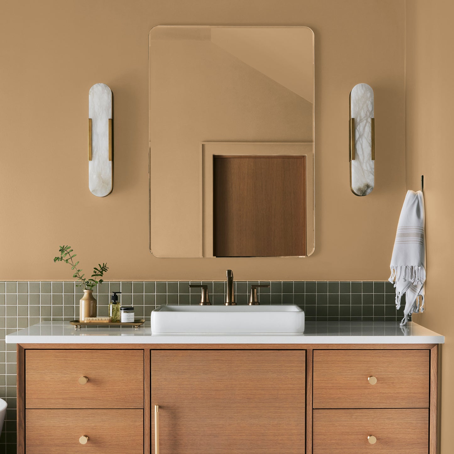 medium golden-yellow paint named bright days shown painted on bathroom wall