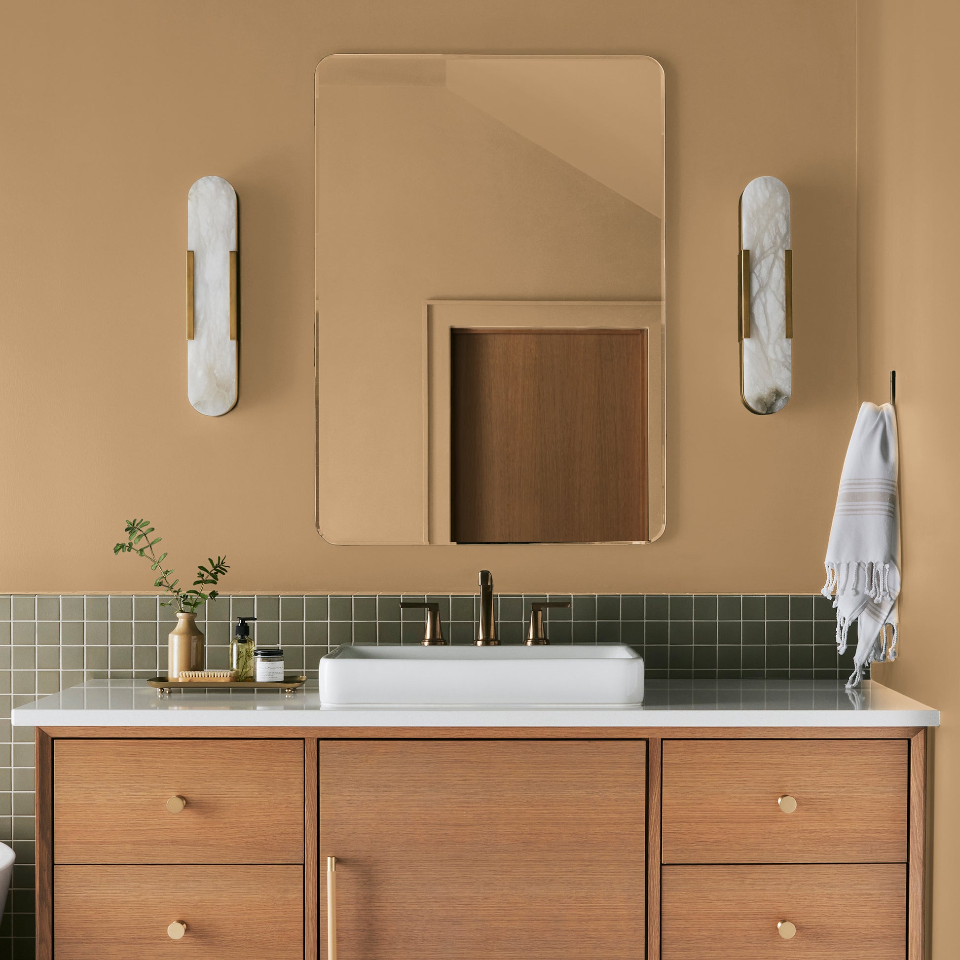 medium golden-yellow paint named bright days shown painted on bathroom wall