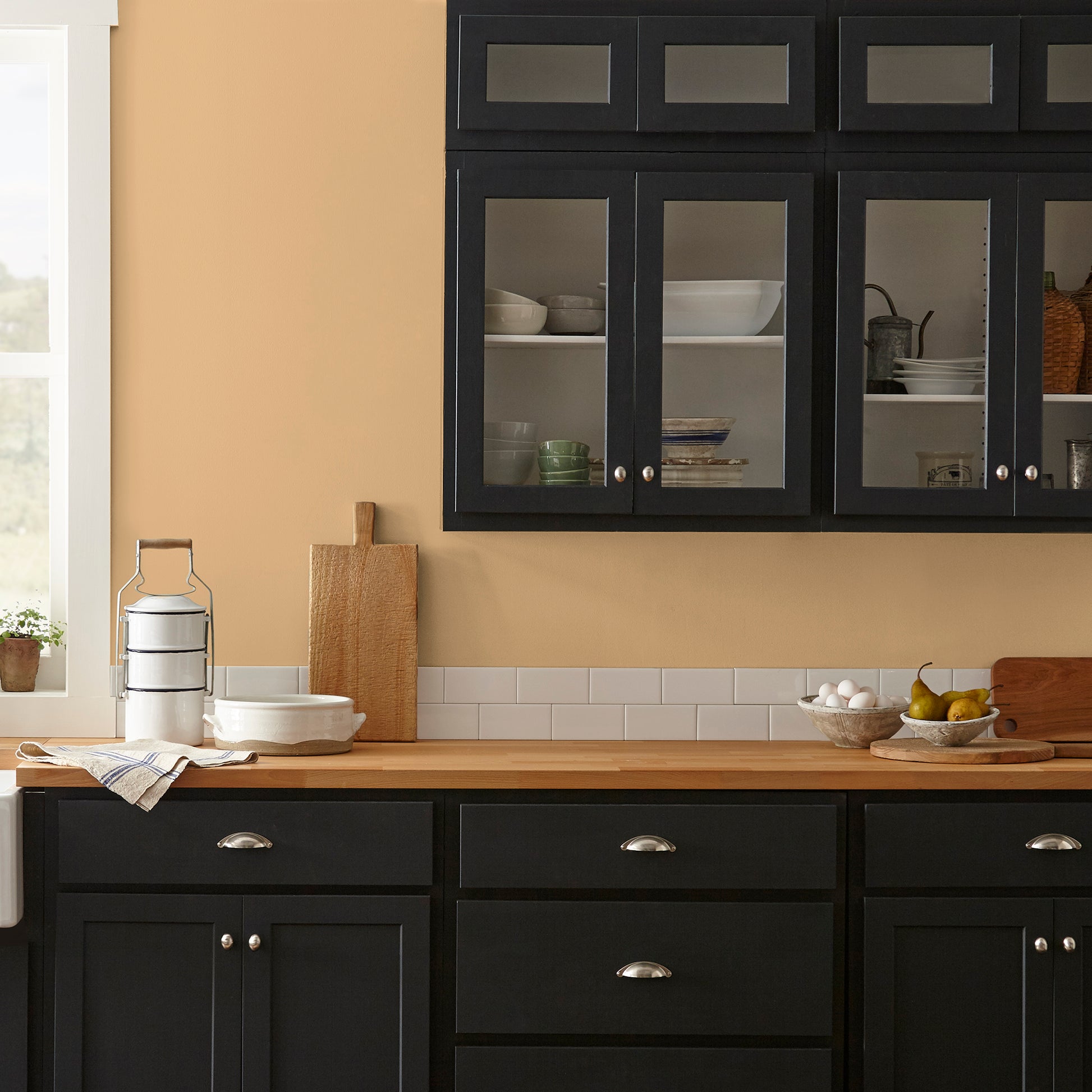 medium golden-yellow paint named bright days shown painted on kitchen wall