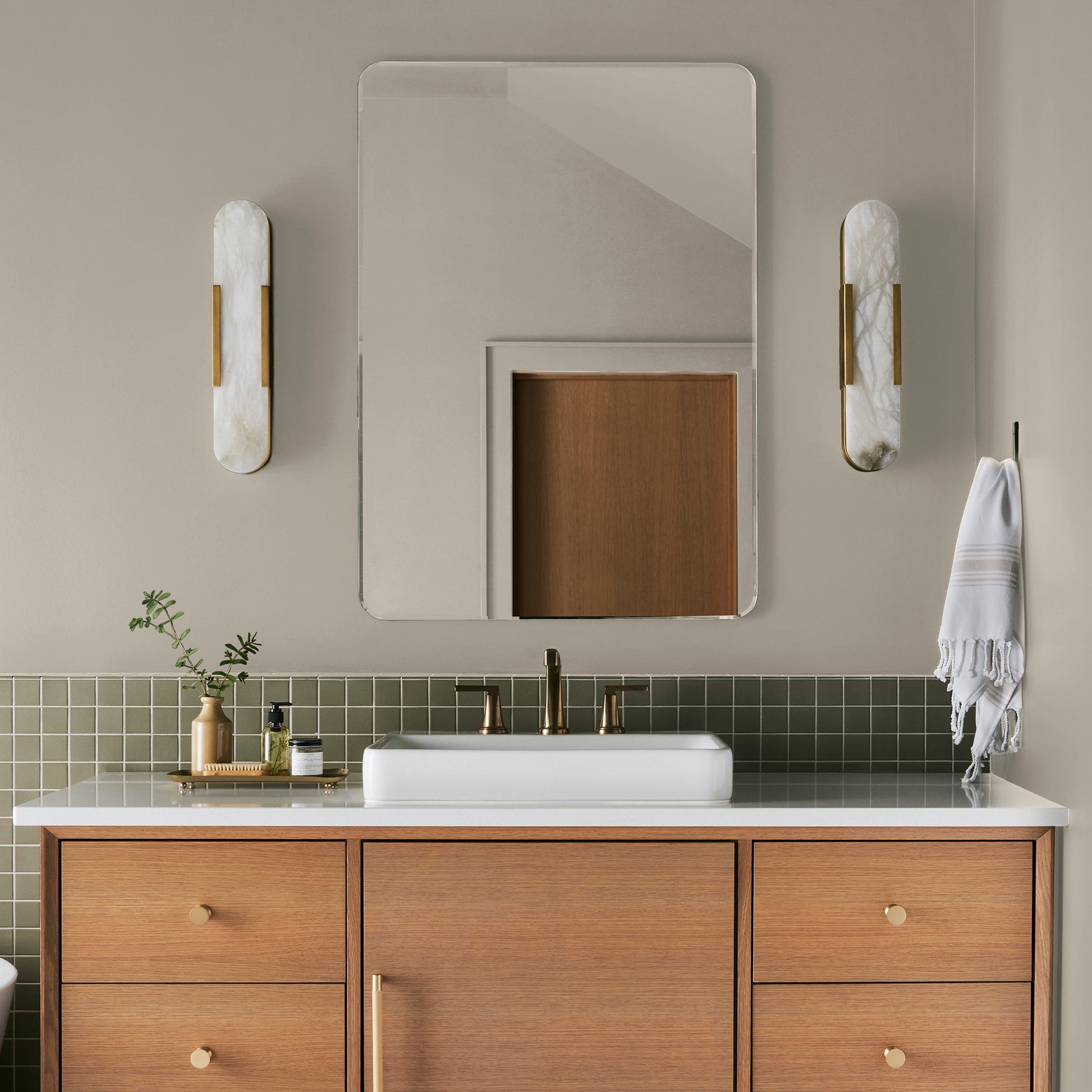 Dusty beige and tan interior paint named southern grown shown painted on bathroom wall