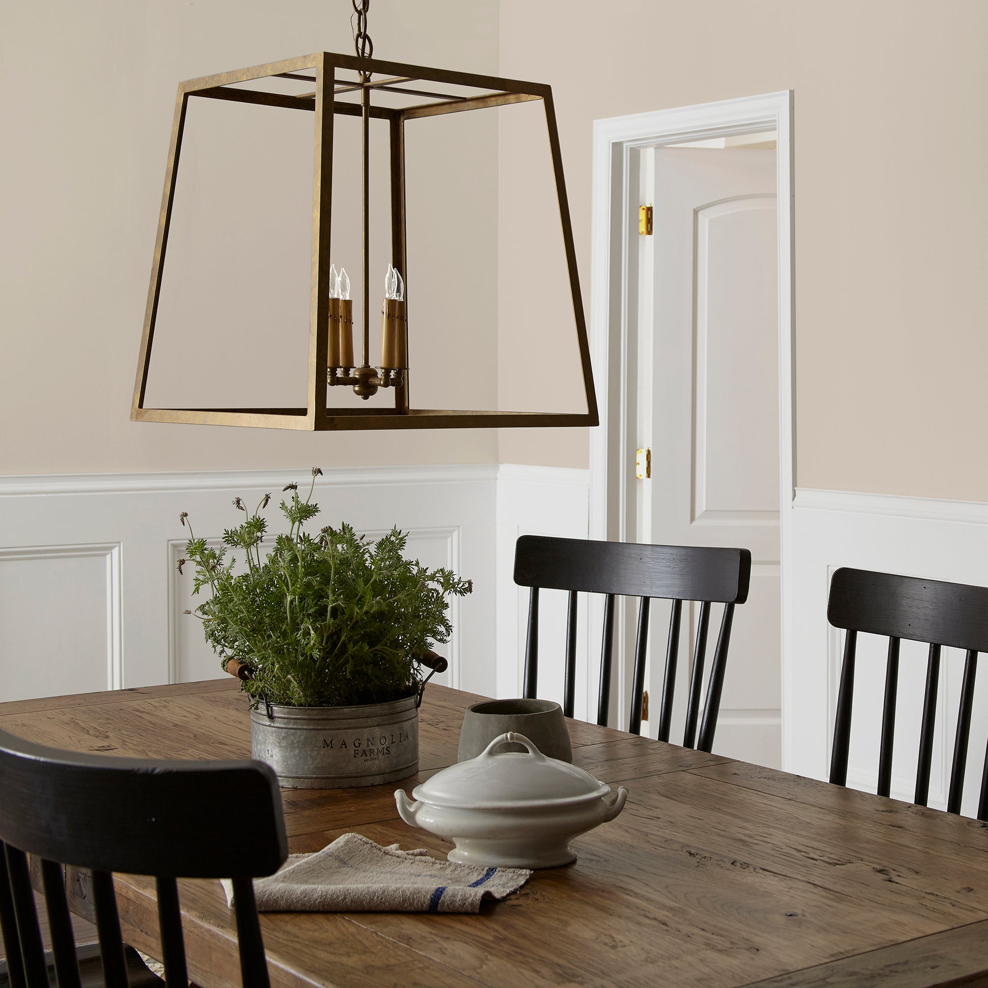 Dusty beige and tan interior paint named southern grown shown painted on dining room wall