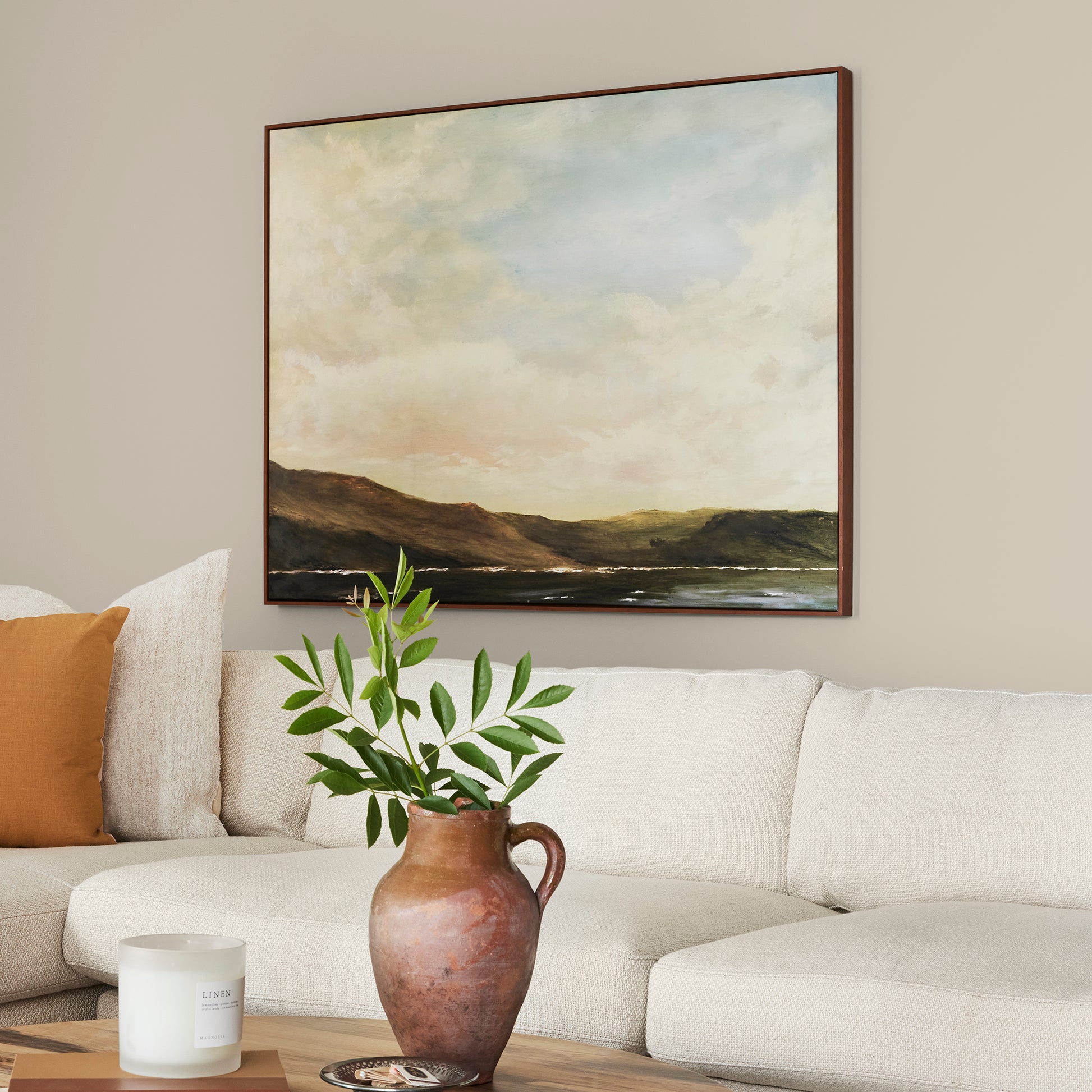 Dusty beige and tan interior paint named southern grown shown painted on living room wall