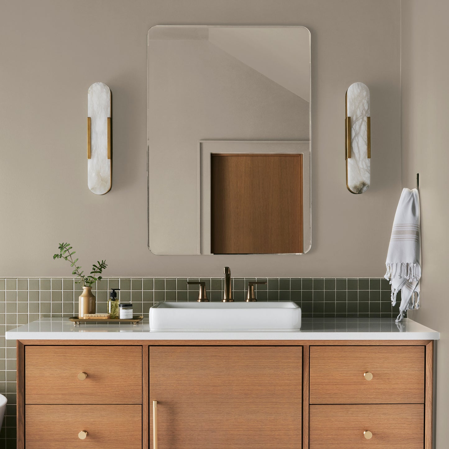 Cool beige dusted with hazel and cocoa interior paint named tapestry thread shown painted on bathroom wall