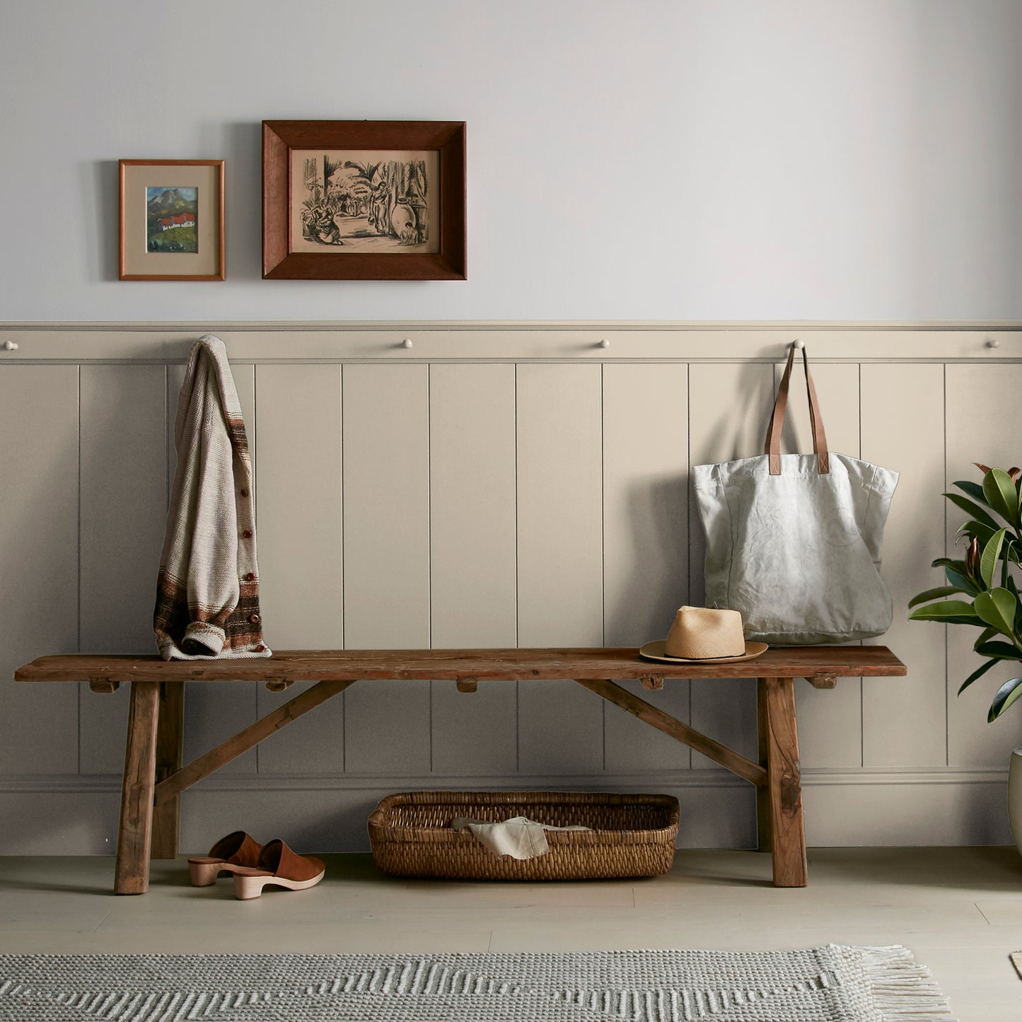 Cool beige dusted with hazel and cocoa interior paint named tapestry thread shown painted on entryway wall