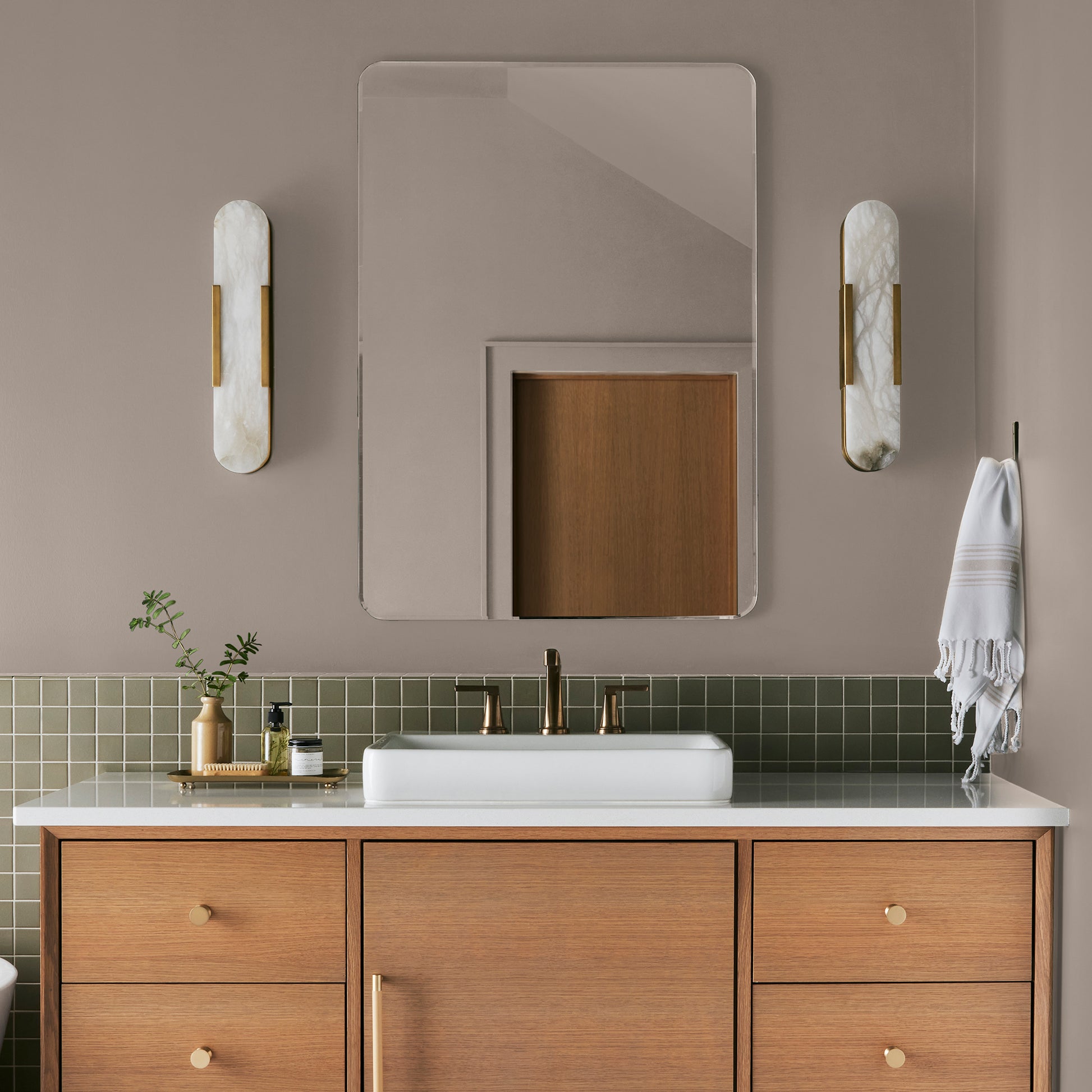 Khaki tan interior paint named rustic oak shown painted on bathroom wall