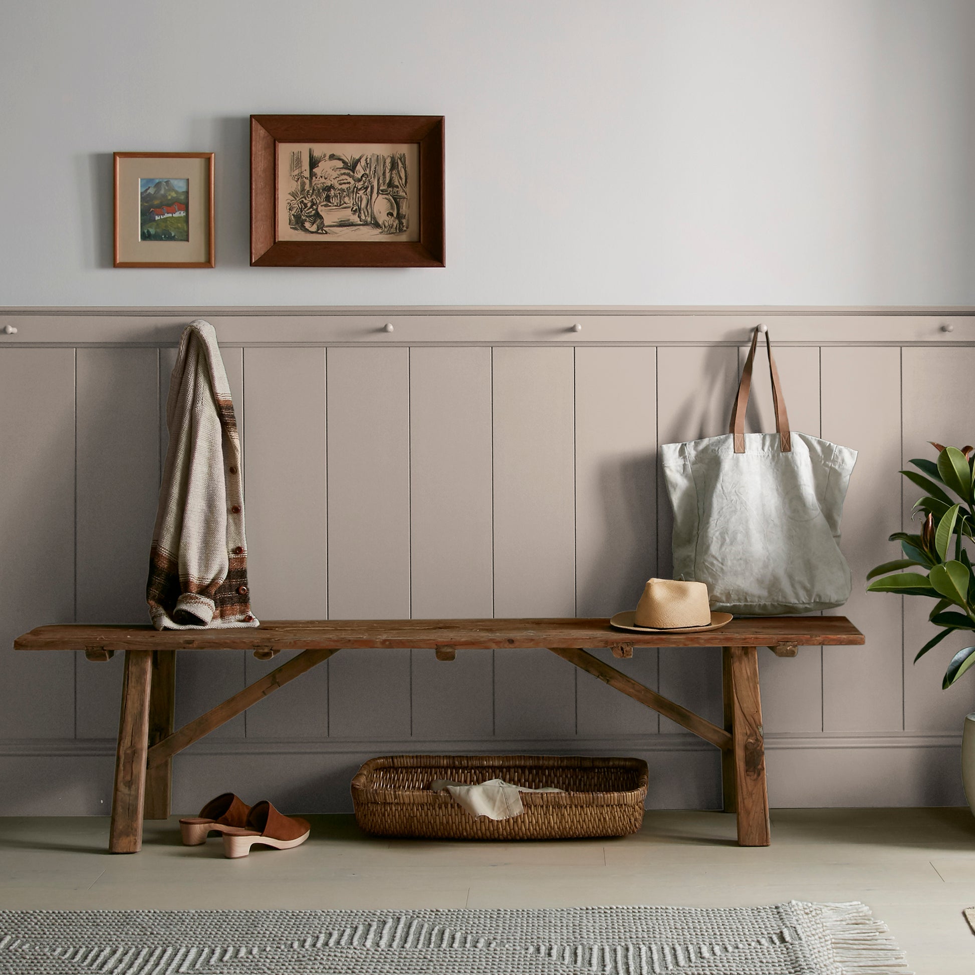 Khaki tan interior paint named rustic oak shown painted on entryway wall