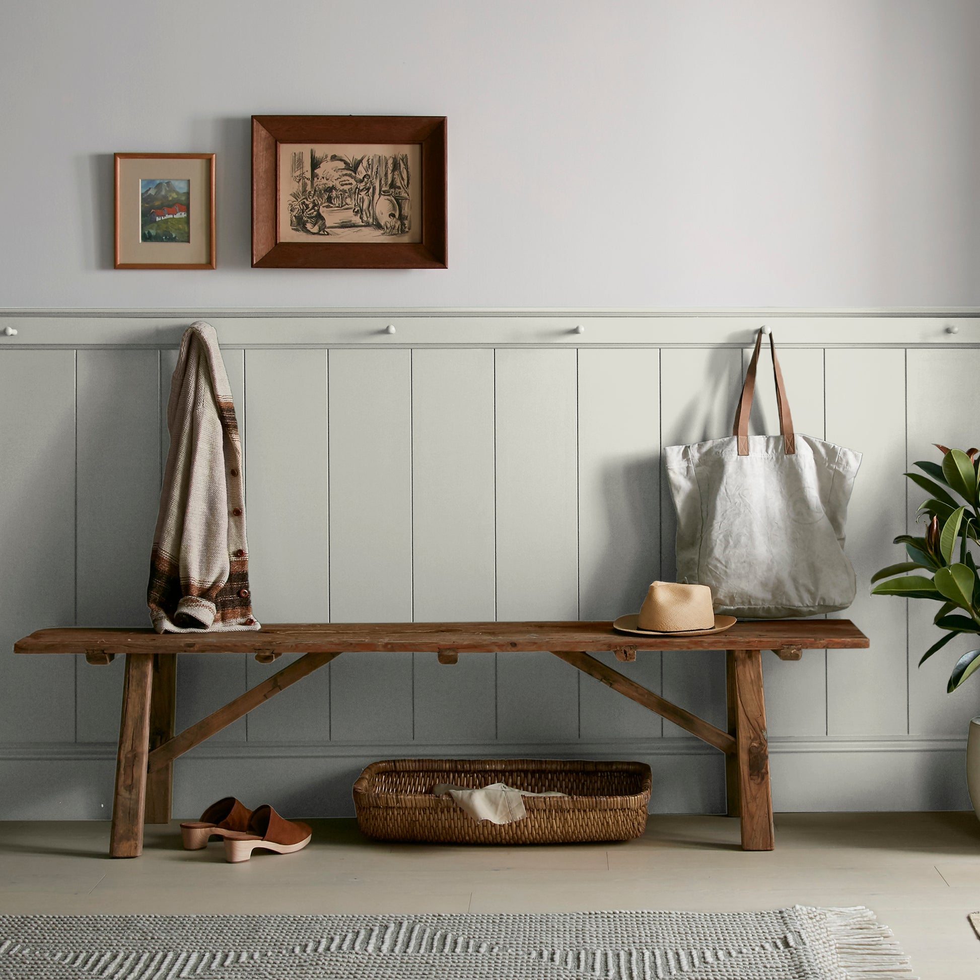 Almost white with cool mint accents interior paint named stoneware pieces shown painted on entryway wall