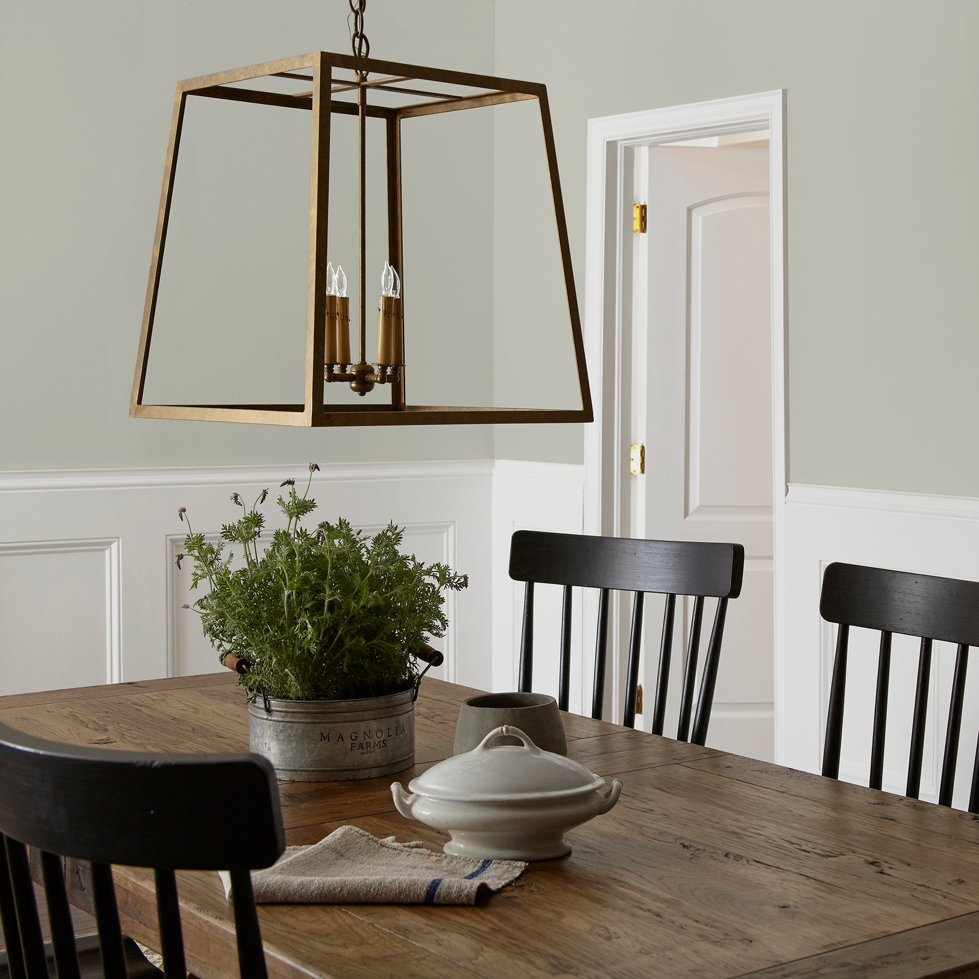 Creamy mint green interior paint named clean lines shown painted on dining room wall