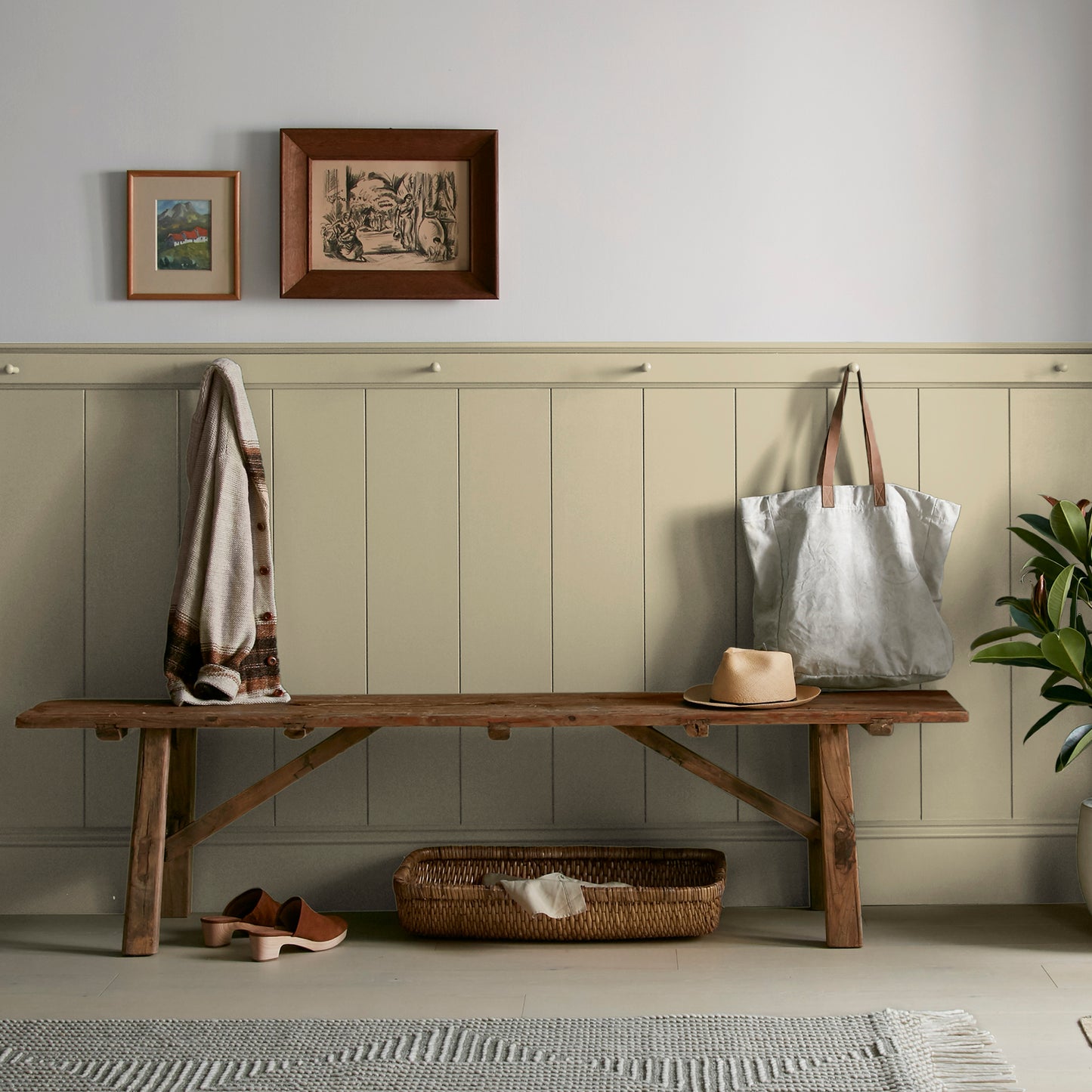 Light green yellow interior paint named sour apple shown painted on entryway wall