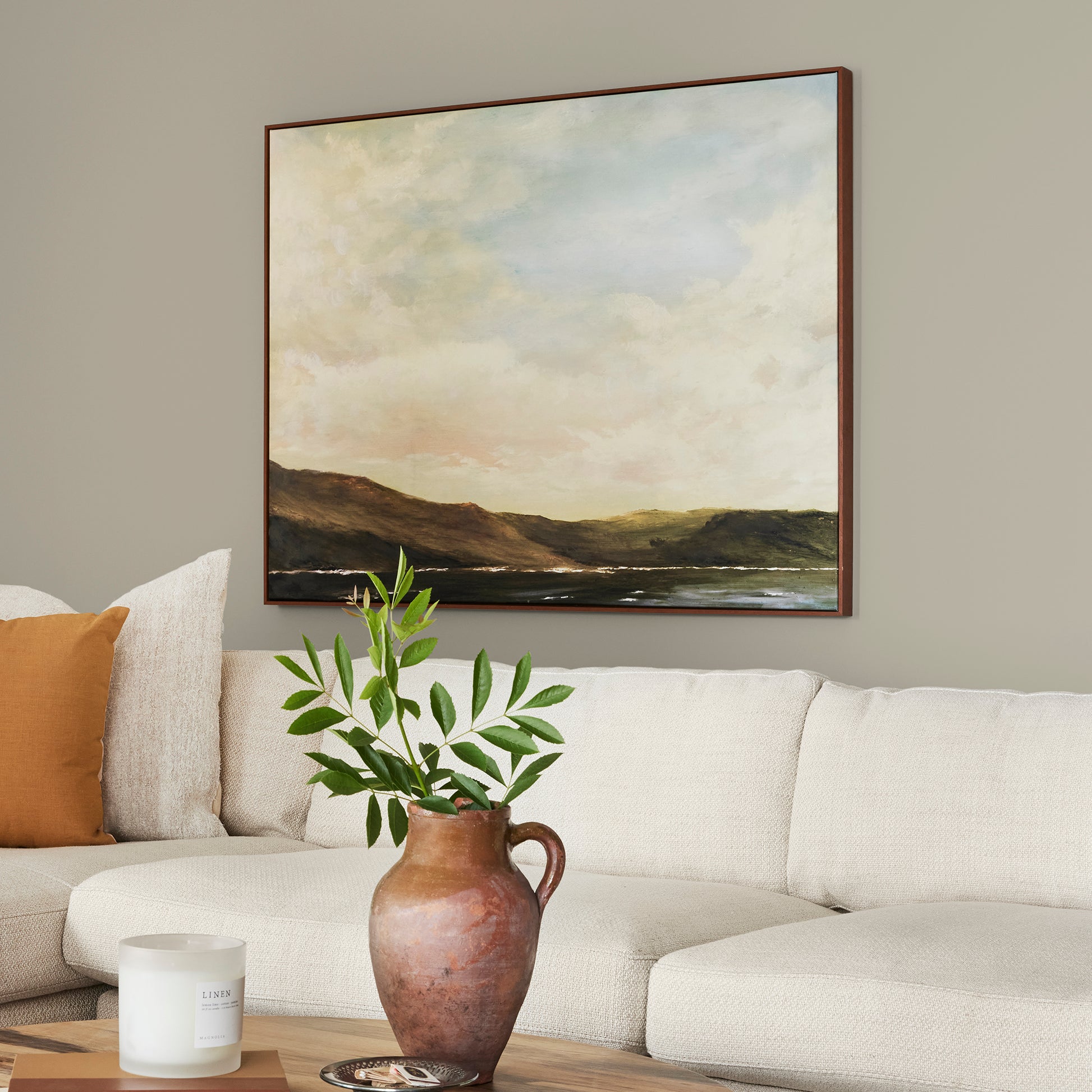 Muted apple green with gray accents interior paint named seasonal shown painted on living room wall