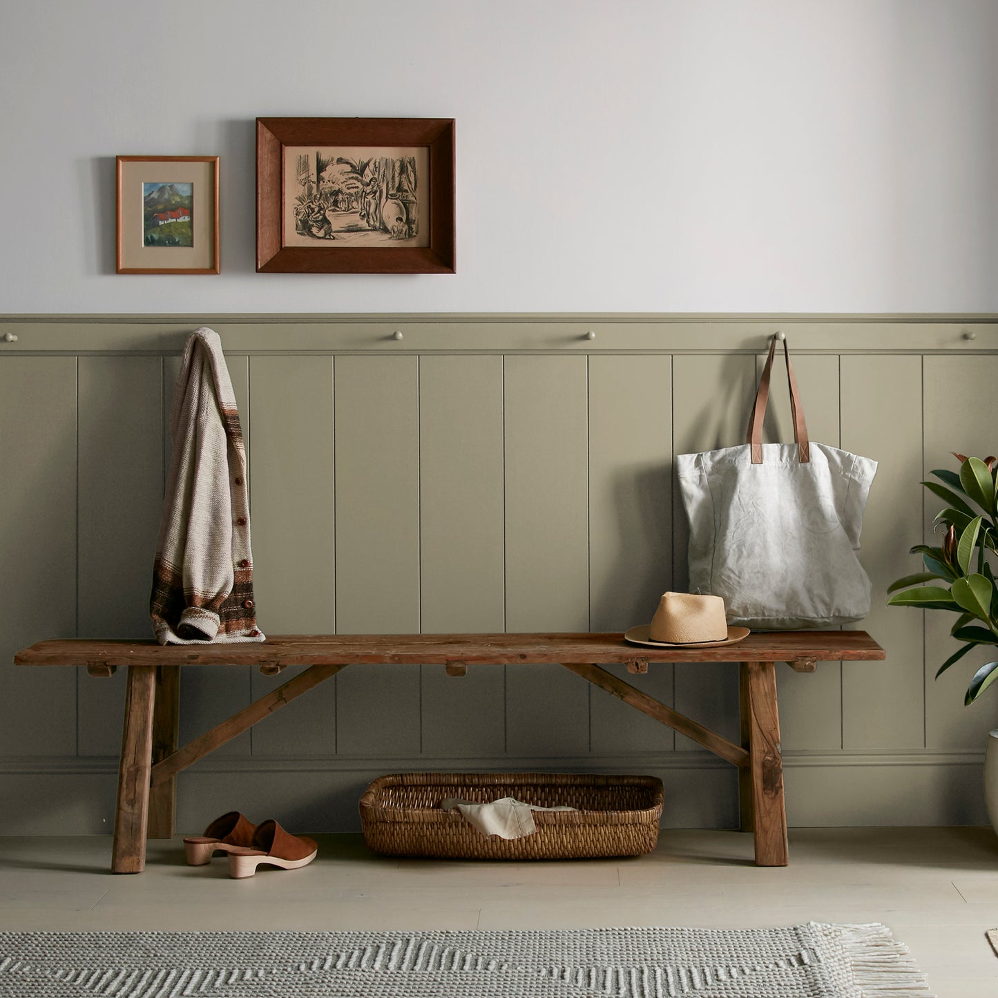 Ashy olive green interior paint named countryside shown painted on entryway wall