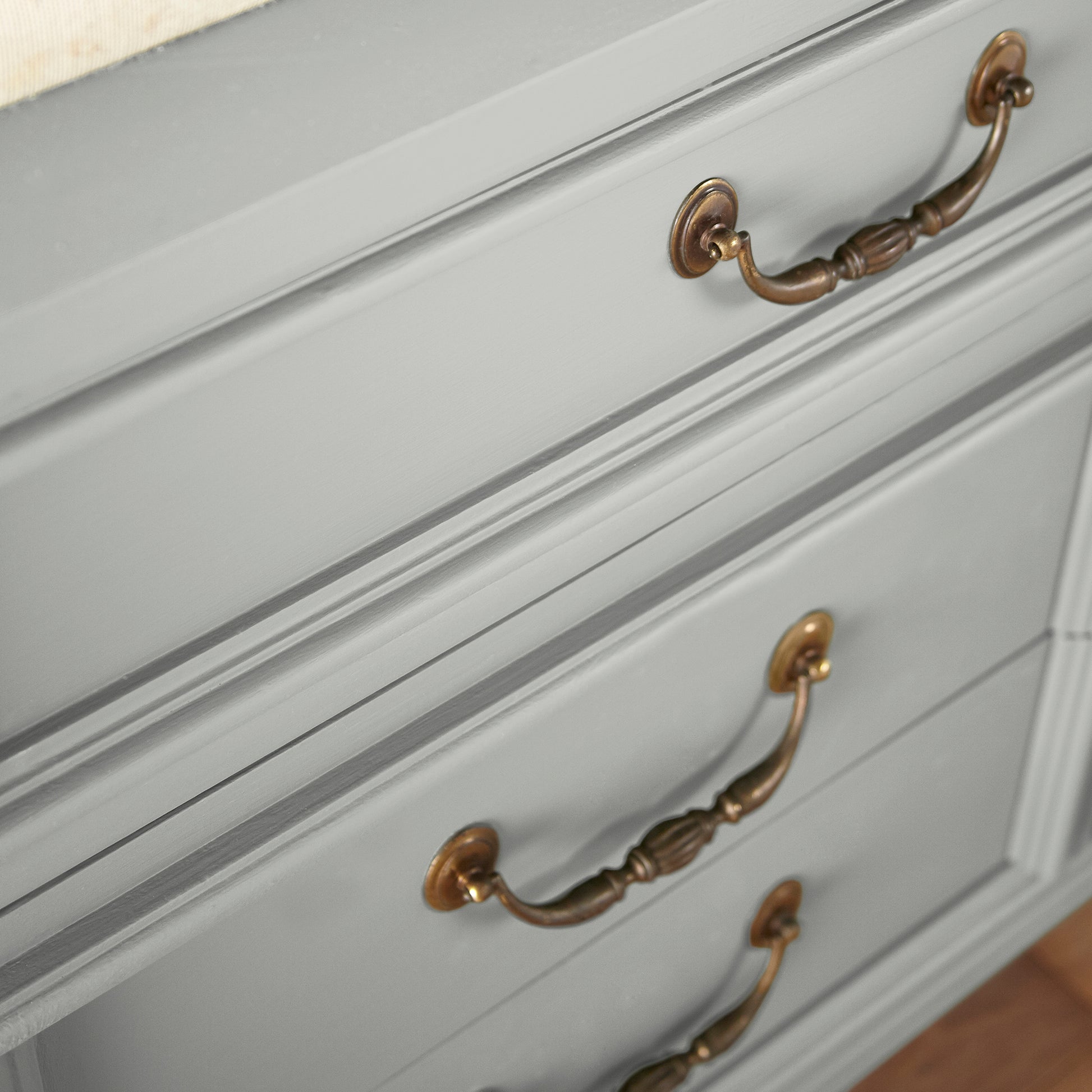 Light mid-tone gray door and cabinet paint named day-to-day shown painted on cabinet