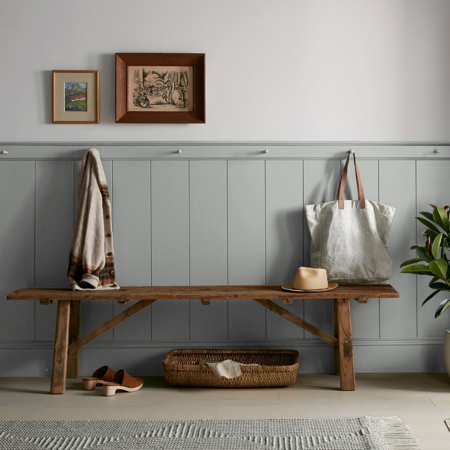 warm charcoal grey interior paint named vintage weathervane shown painted on entryway wall