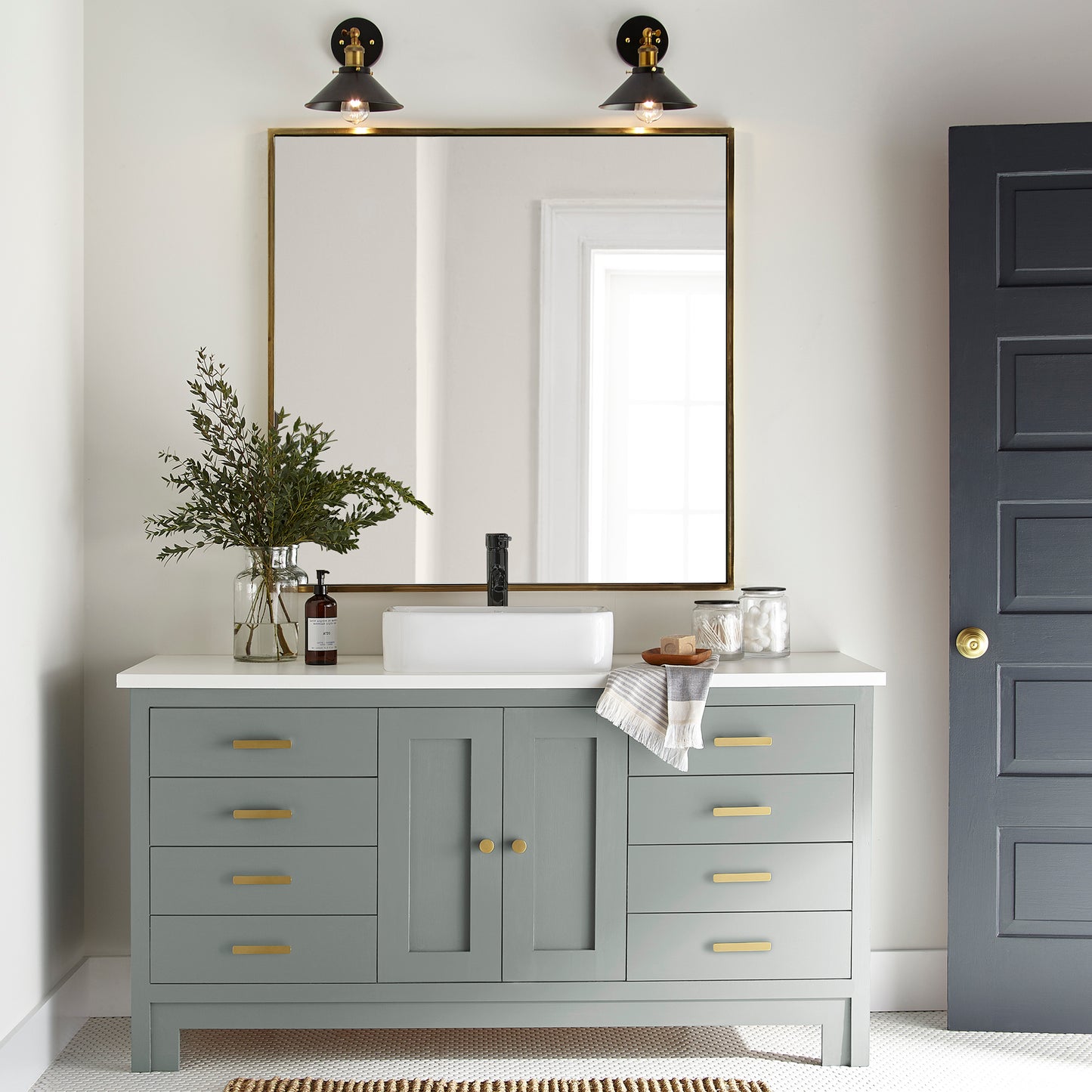 Cement gray with blue undertones door and cabinet paint named clean slate shown painted on bathroom cabinet