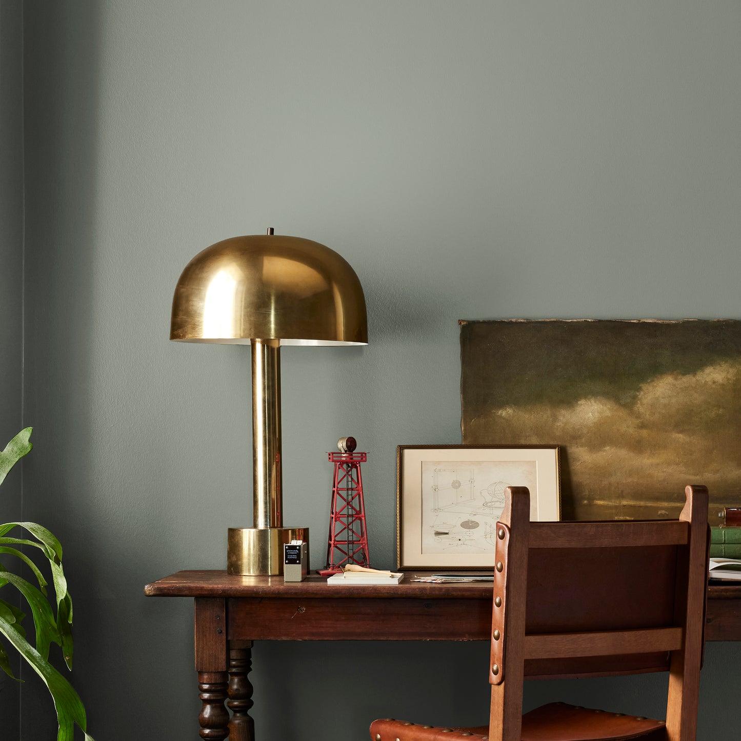Pale ivy green interior paint named eden shown painted on bedroom wall