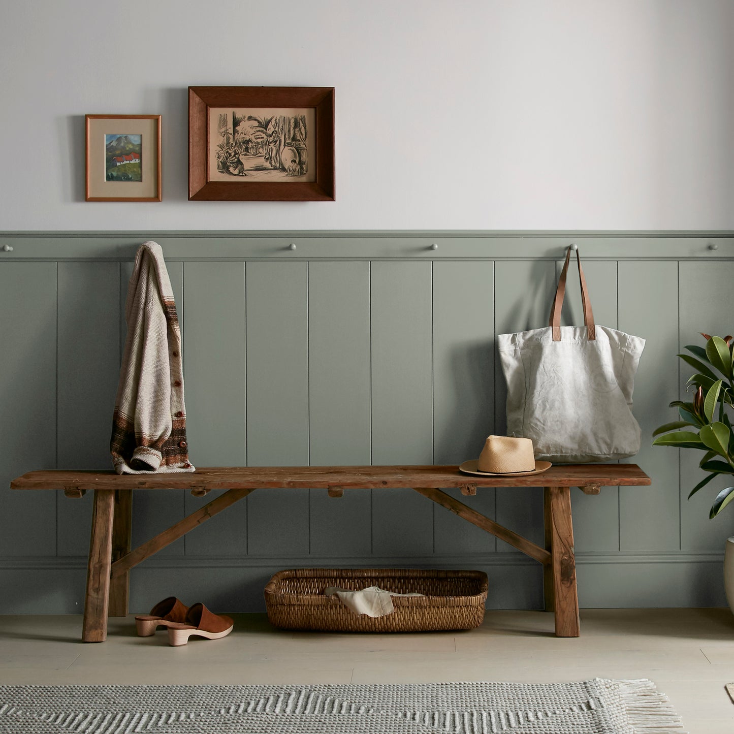 Pale ivy green interior paint named eden shown painted on entryway wall