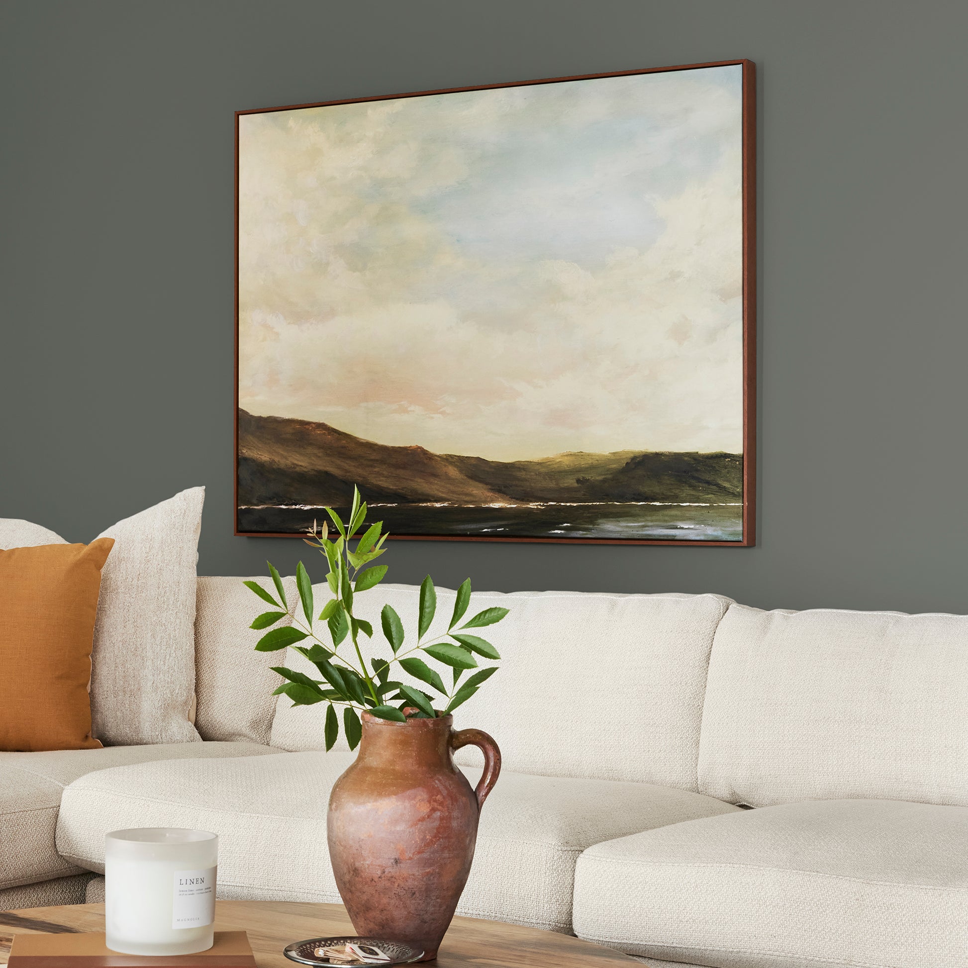 Dark hunter green interior paint named Locally Grown shown painted on living room wall