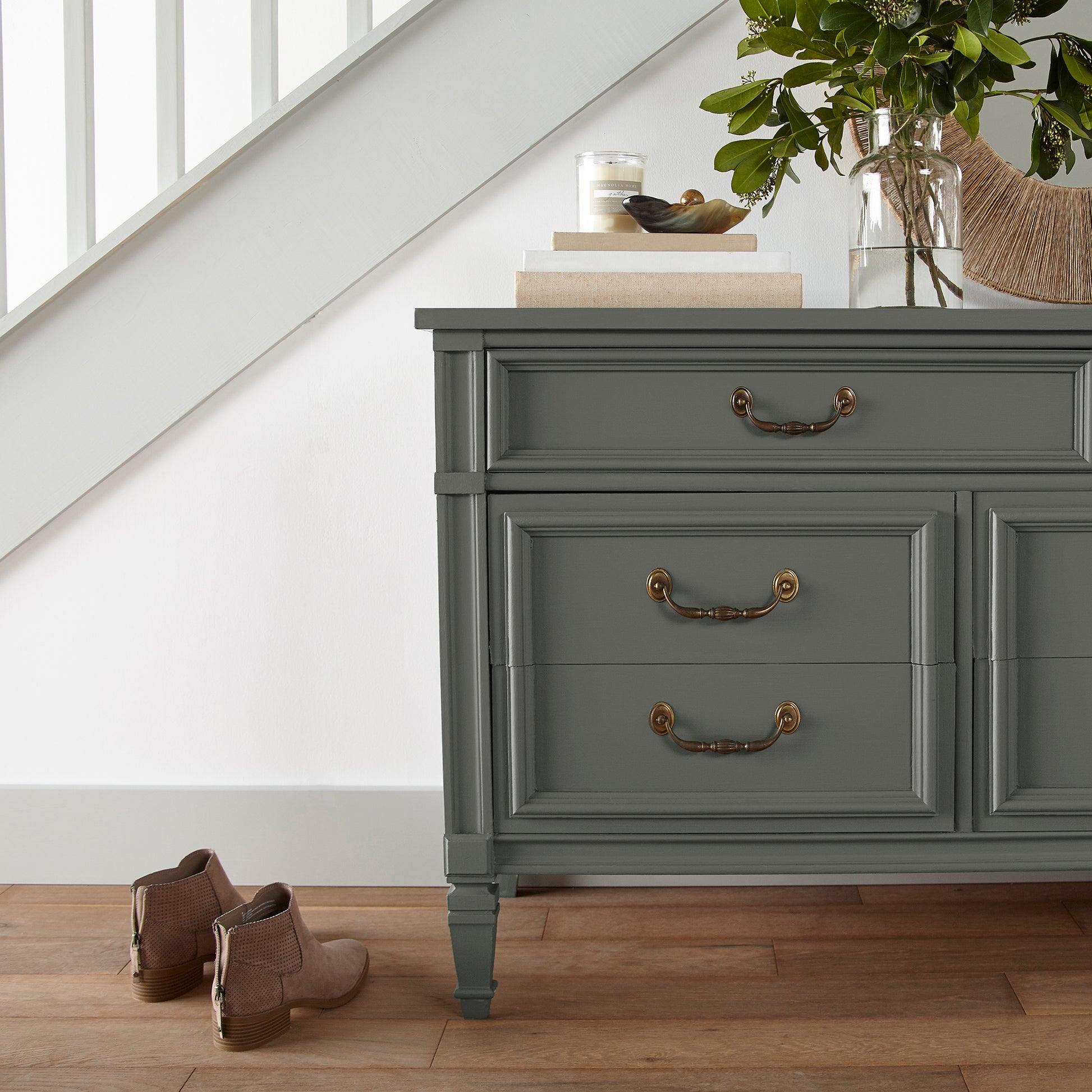 Dark hunter green dusted with olive tones door and cabinet paint named locally grown shown painted on entryway cabinet
