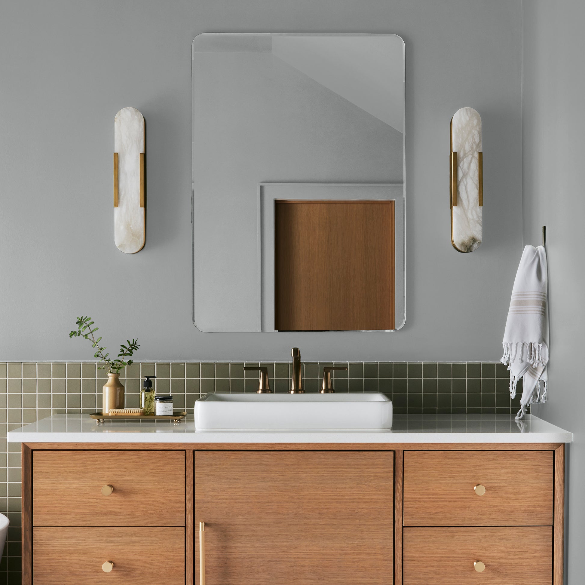 Light silver gray interior paint named loft shown painted on bathroom wall