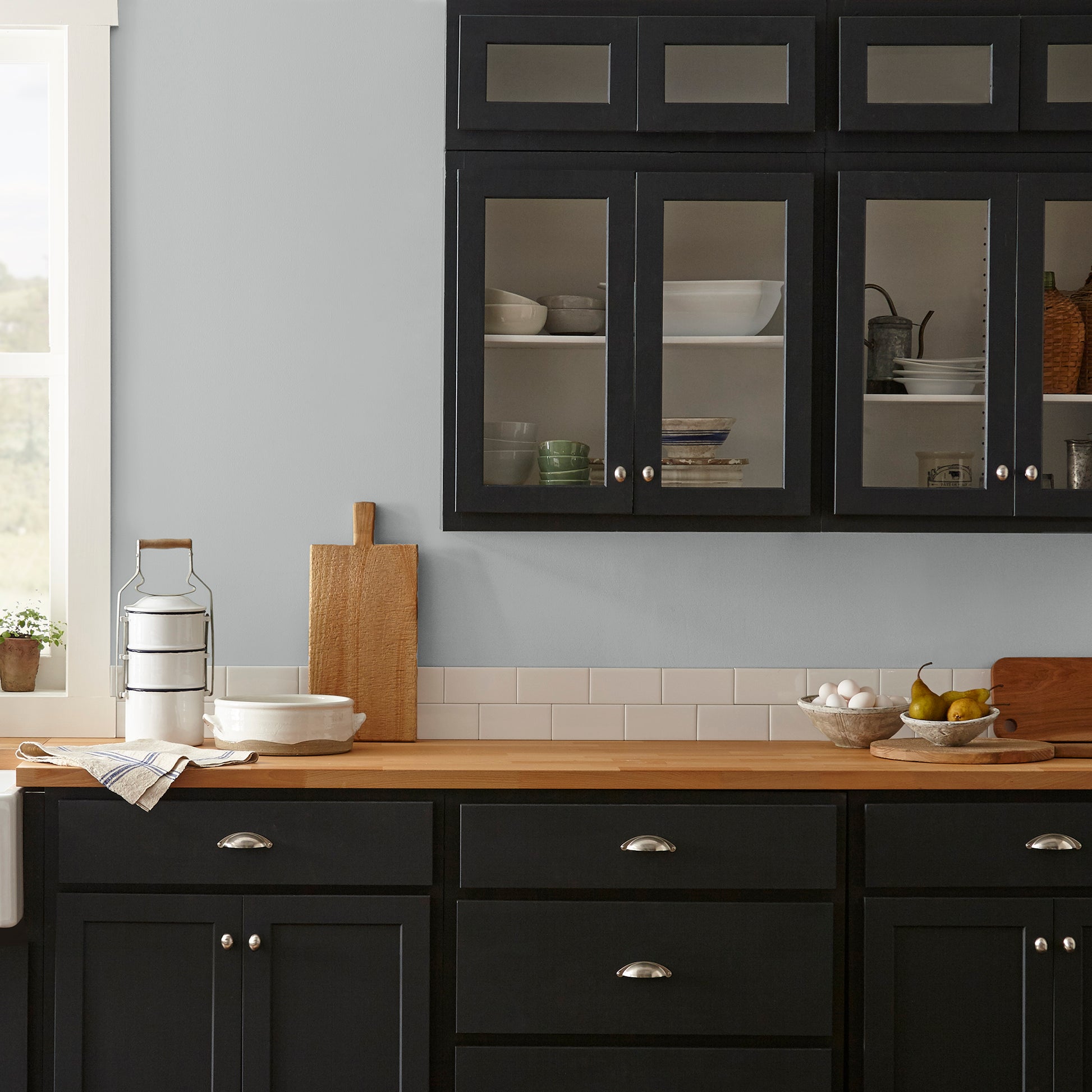 Light silver gray interior paint named loft shown painted on kitchen wall