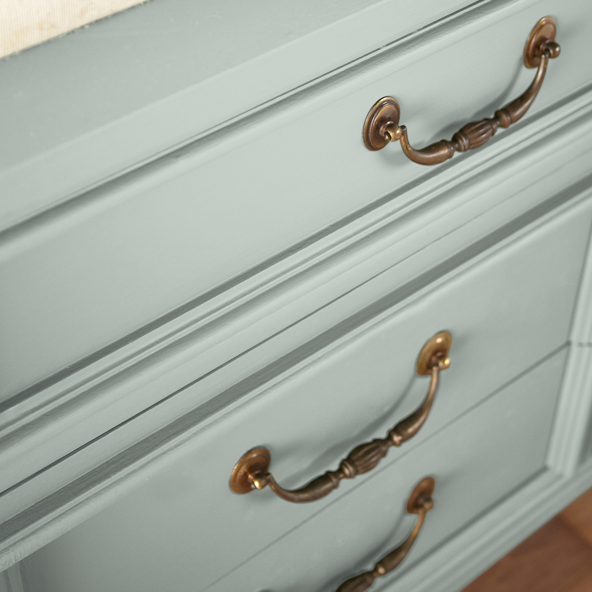 Frosty mint with green and light blue accents door and cabinet paint named mineral green shown painted on cabinet