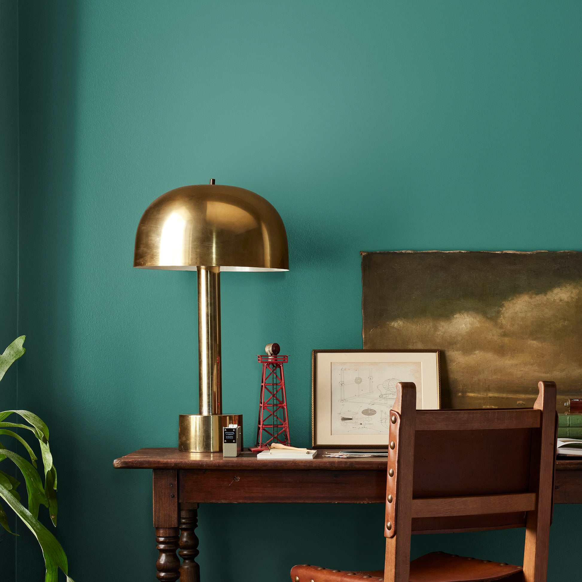 crisp hunter green with golden accents paint named aspen leaf shown painted on bedroom wall