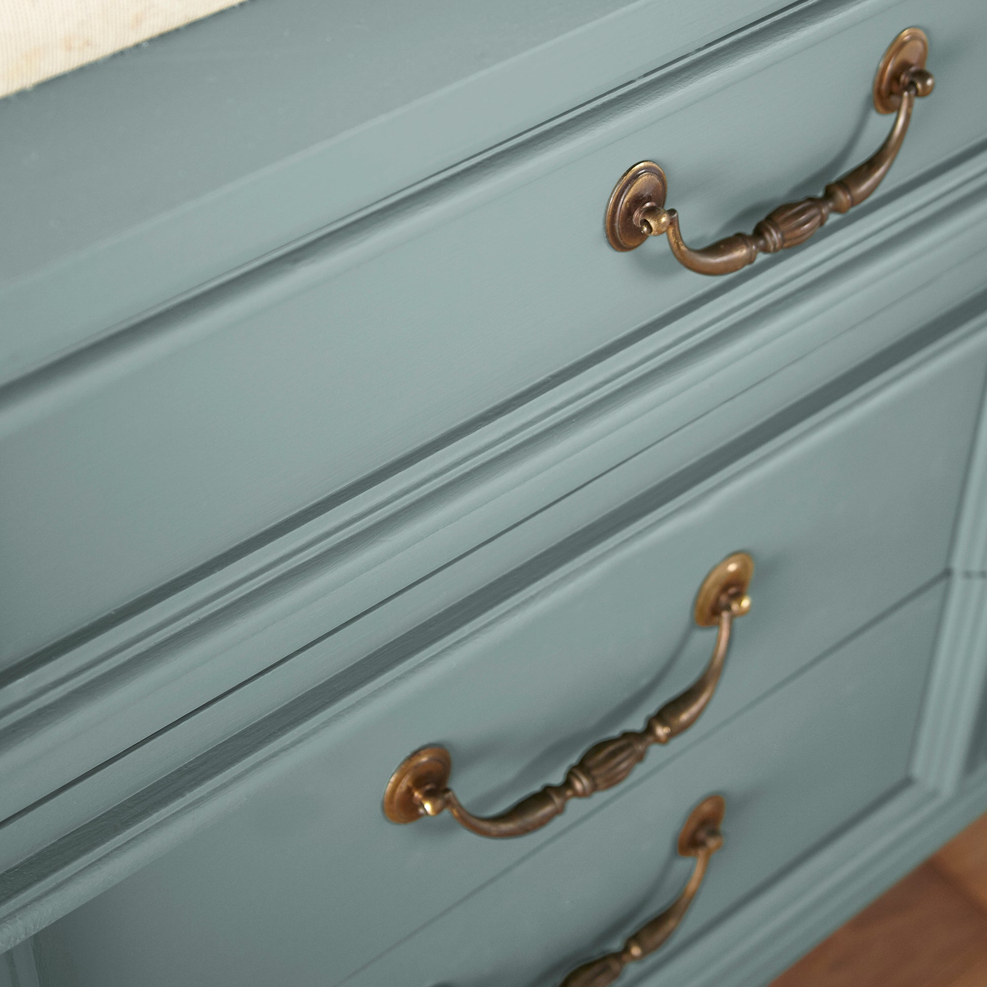 Ashy green with aqua undertones door and cabinet paint named well watered shown painted on cabinet