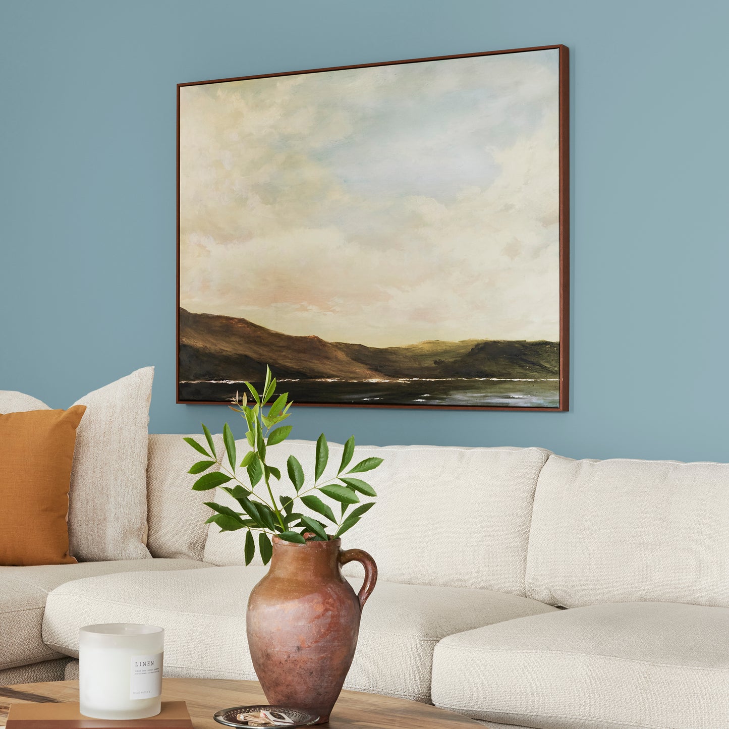 washed denim blue interior paint named winter solstice shown painted on living room wall