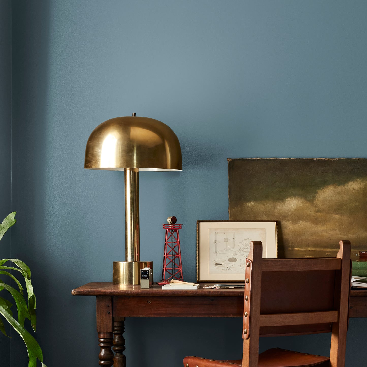 deep steel blue with grey undertone paint named blue skies shown painted on bedroom wall