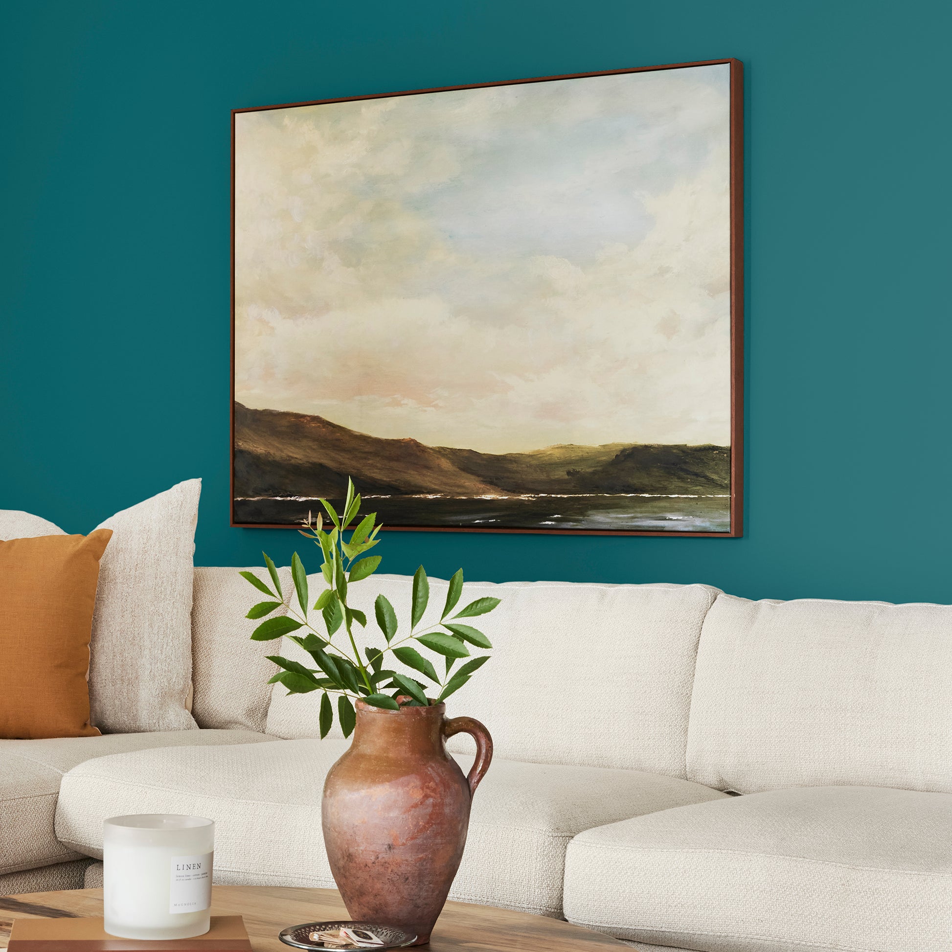 A deep peacock blue interior paint named under the stars shown painted on living room wall