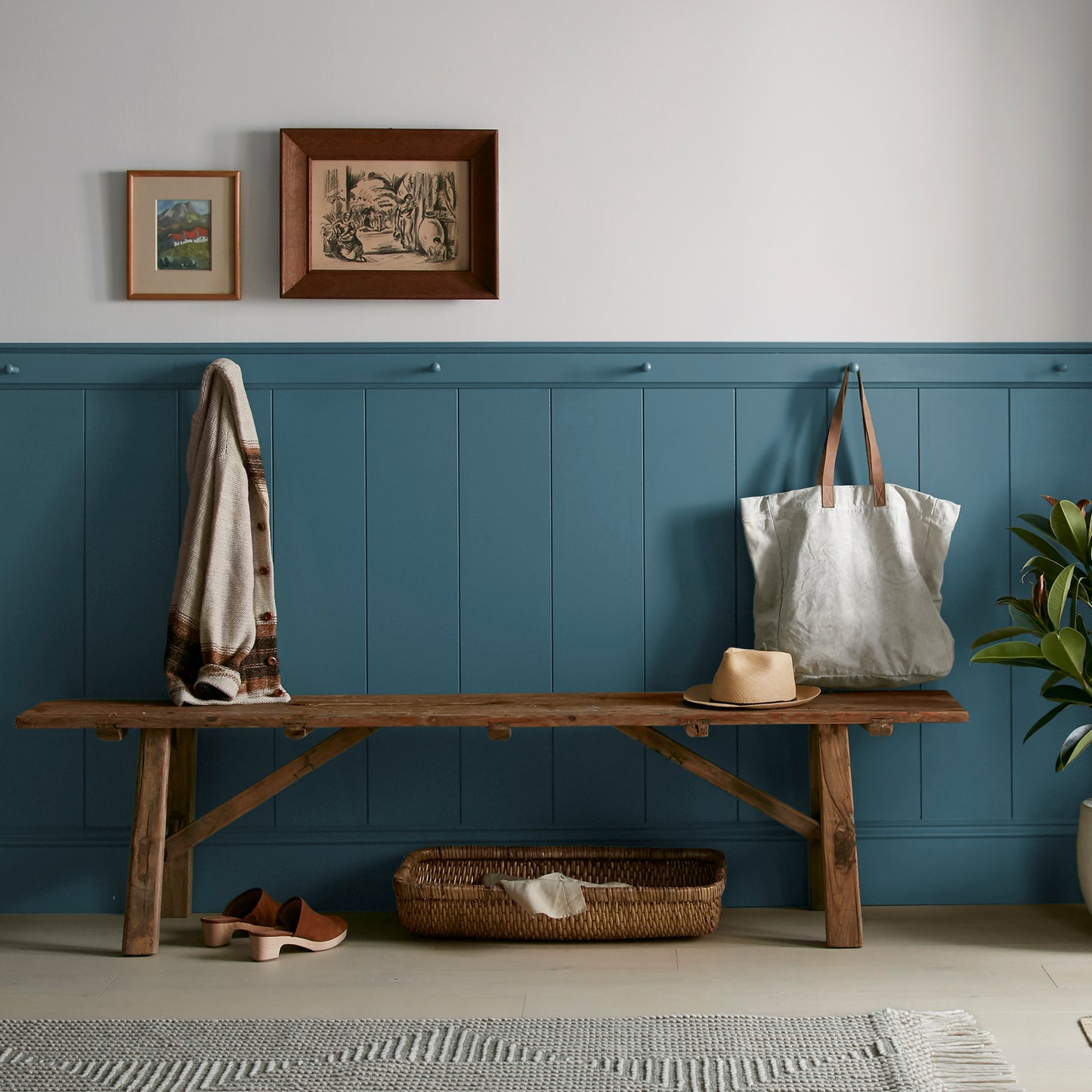 Deep denim blue interior paint named signature shown painted on entryway wall