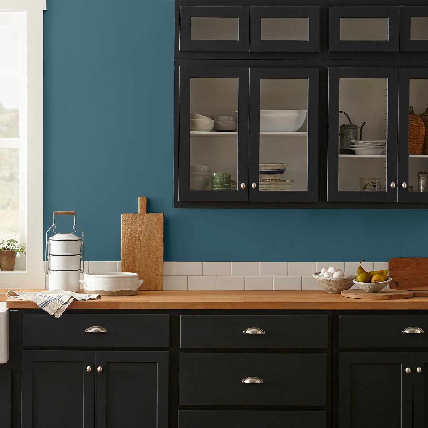 Deep denim blue interior paint named signature shown painted on kitchen wall
