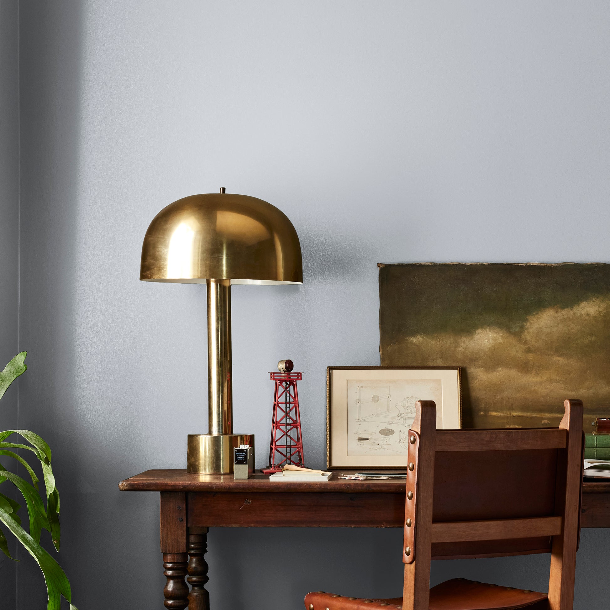 soft cool gray interior paint named cement pots shown painted on bedroom wall