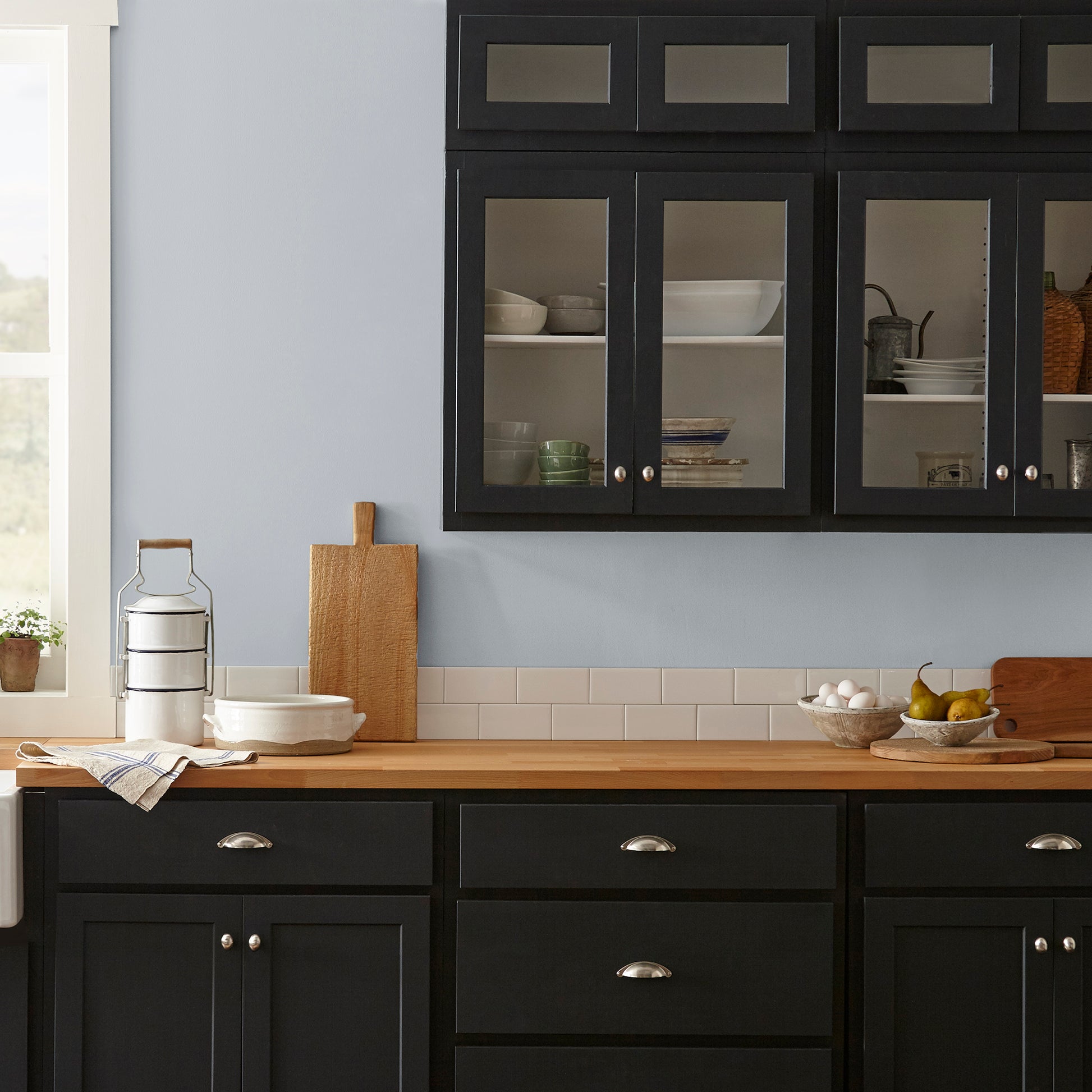 soft cool gray interior paint named cement pots shown painted on kitchen wall