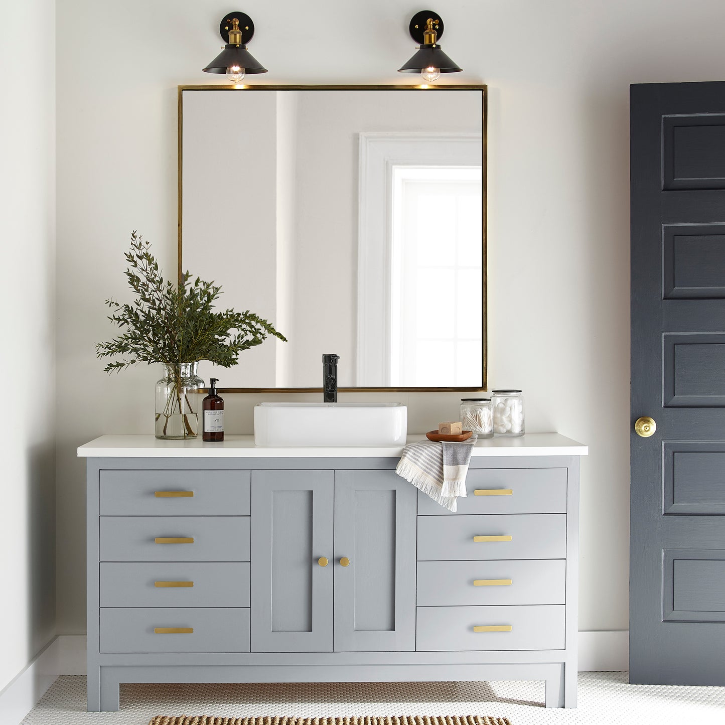 Soft cool gray door and cabinet paint named cement pots shown painted on bathroom cabinet
